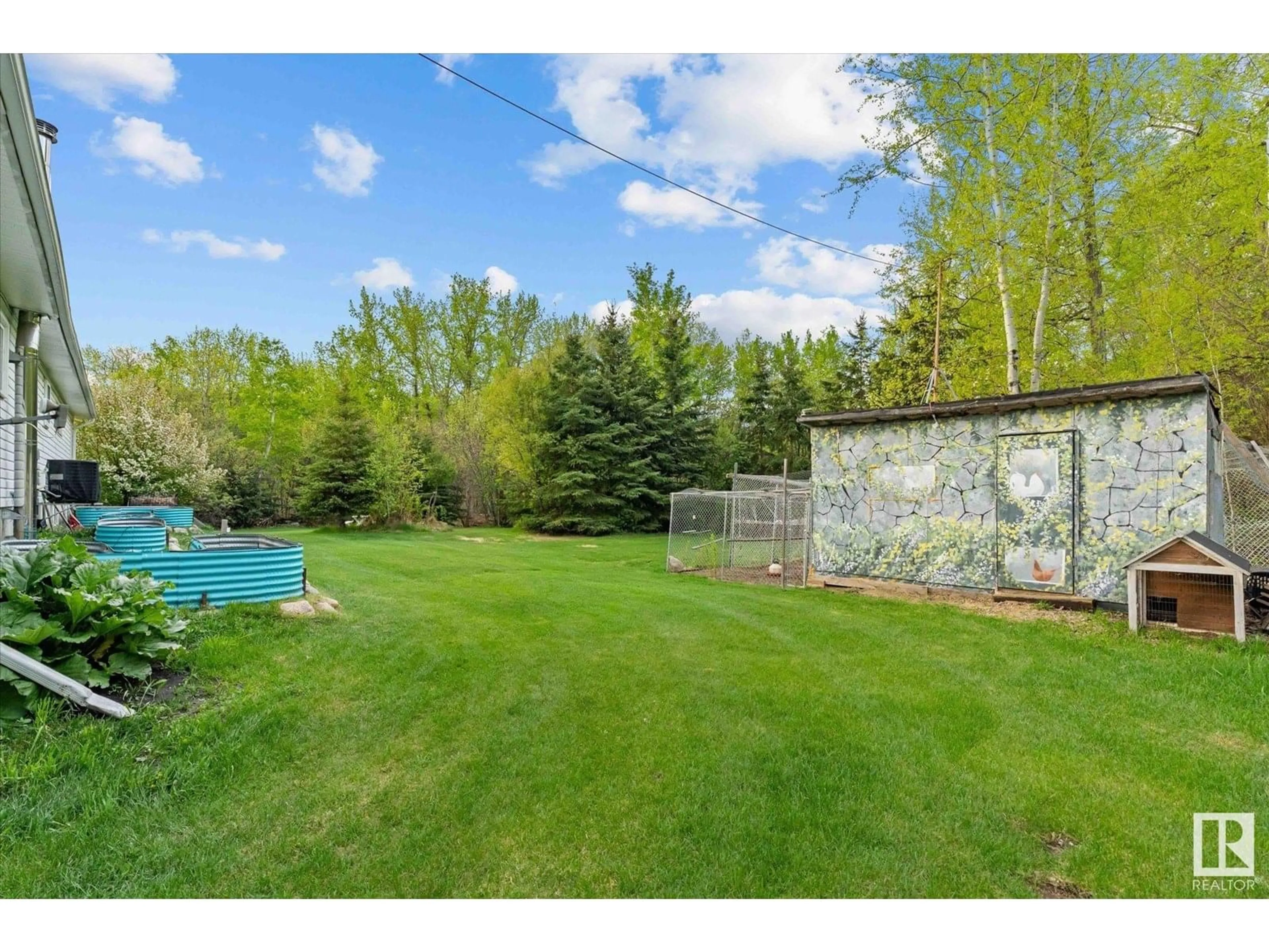 A pic from outside/outdoor area/front of a property/back of a property/a pic from drone, water/lake/river/ocean view for 54113 RGE ROAD 13, Rural Parkland County Alberta T7Y0J2