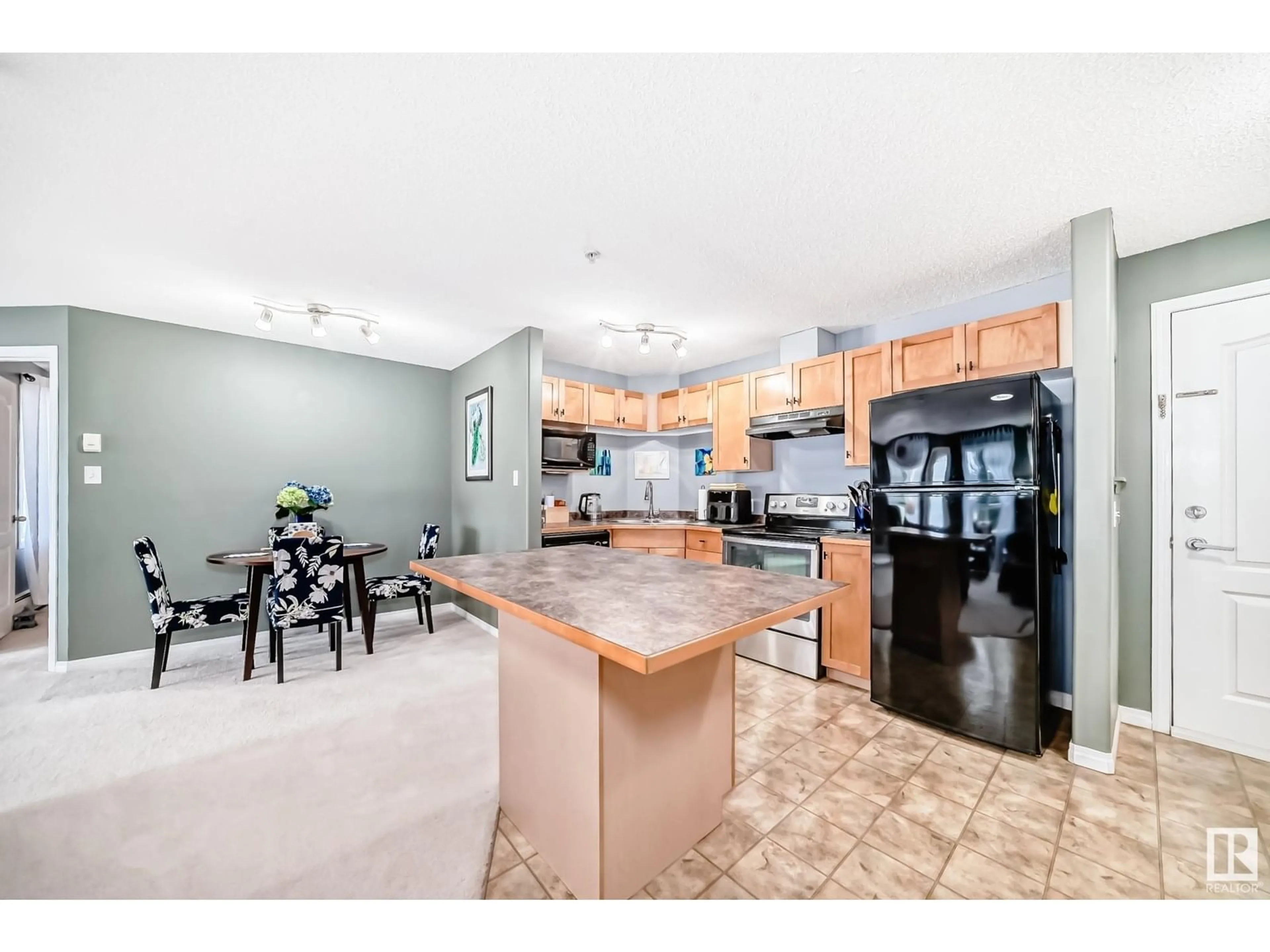 Open concept kitchen, ceramic/tile floor for #205 - 5340 199 ST, Edmonton Alberta T6M0A5