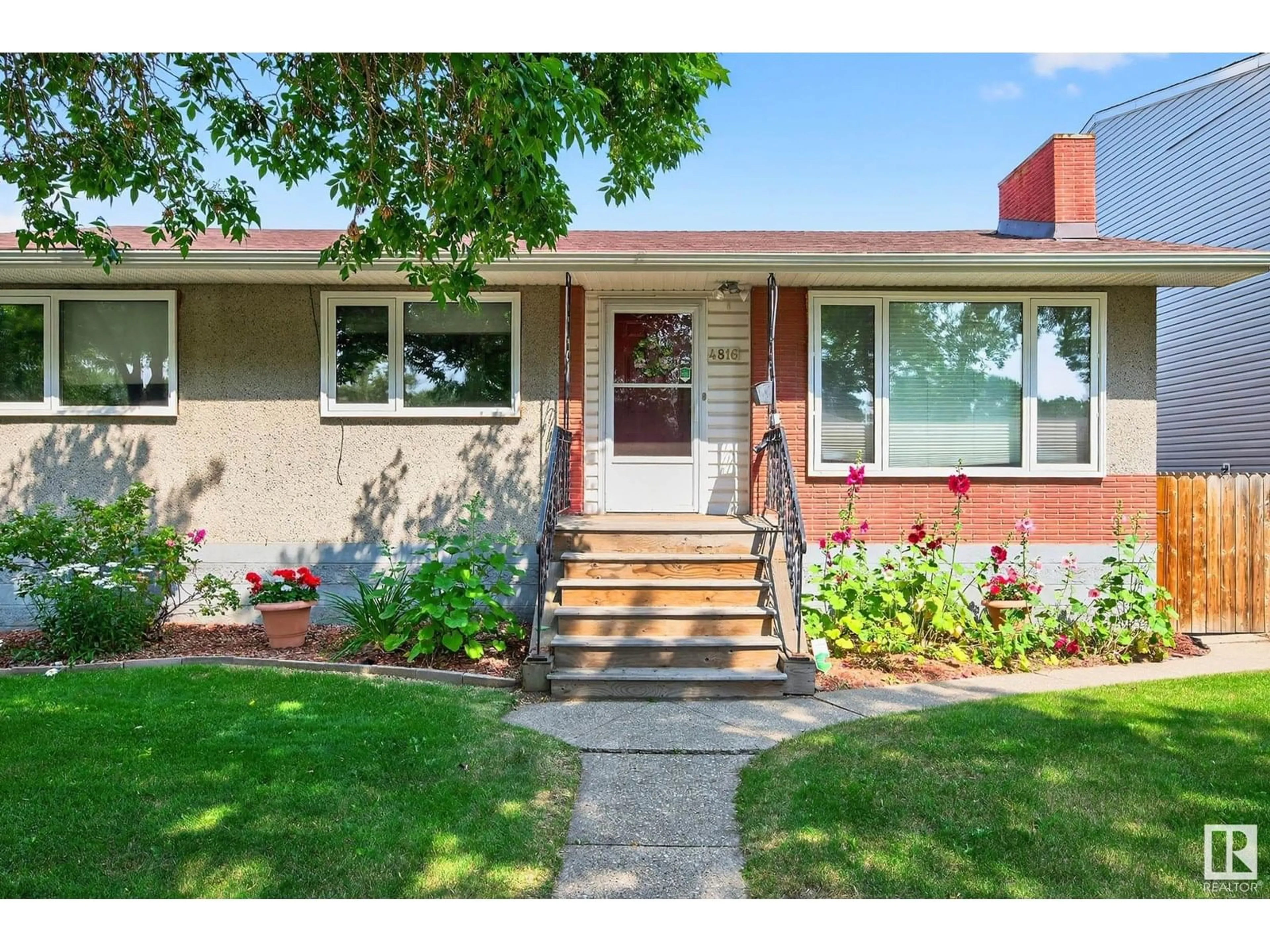Home with brick exterior material, street for 4816 117 AV, Edmonton Alberta T5W0Z1