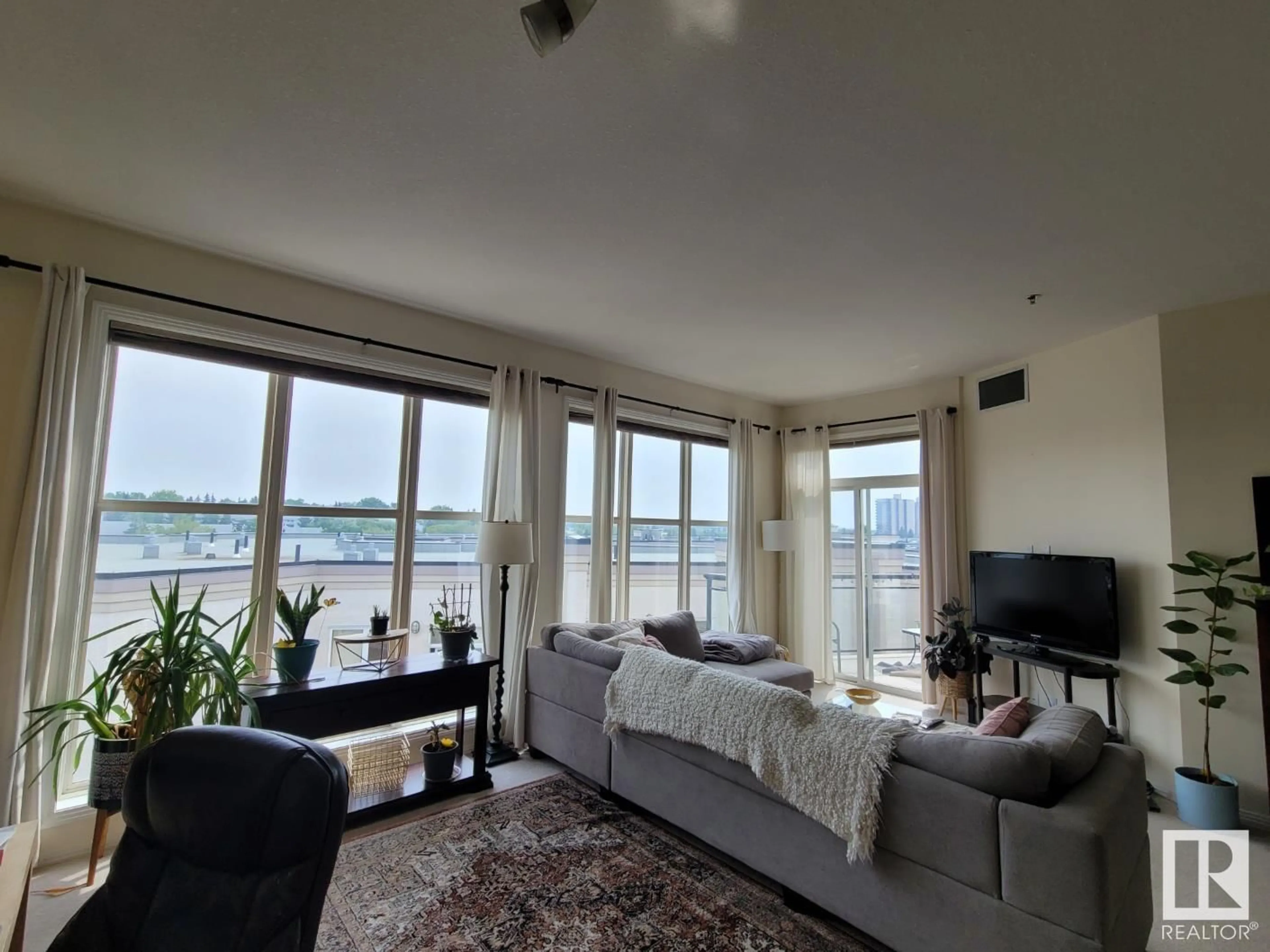 Living room with furniture, unknown for 510 - 4835 104 A ST, Edmonton Alberta T6H0R5