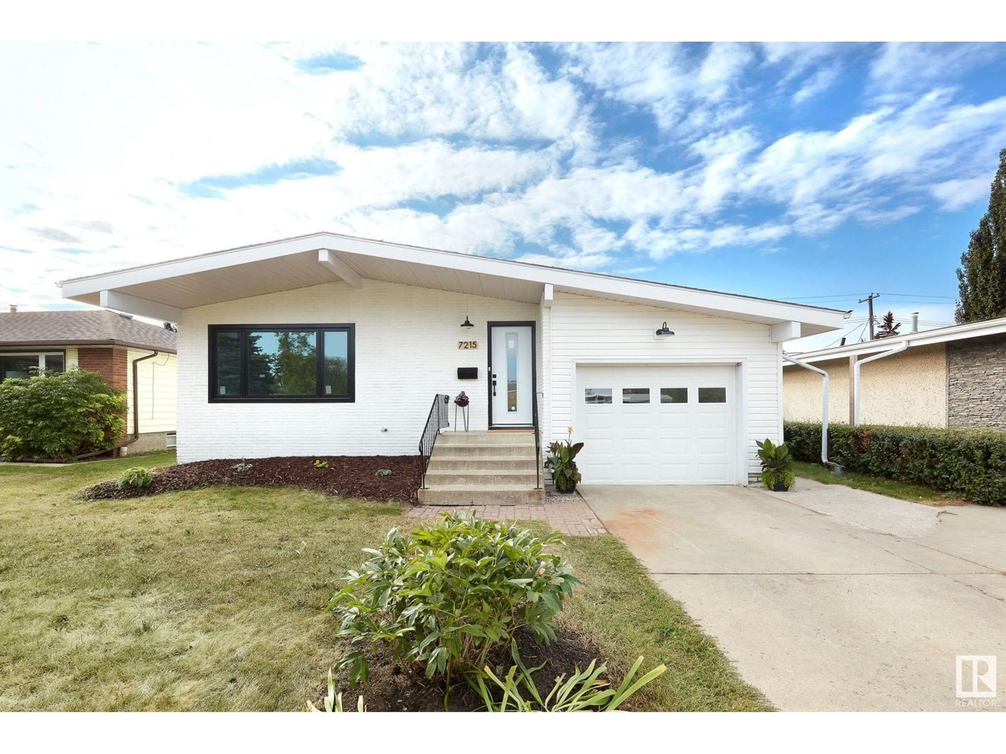 Home with vinyl exterior material, street for NW - 7215 92B AV, Edmonton Alberta T6B0W3