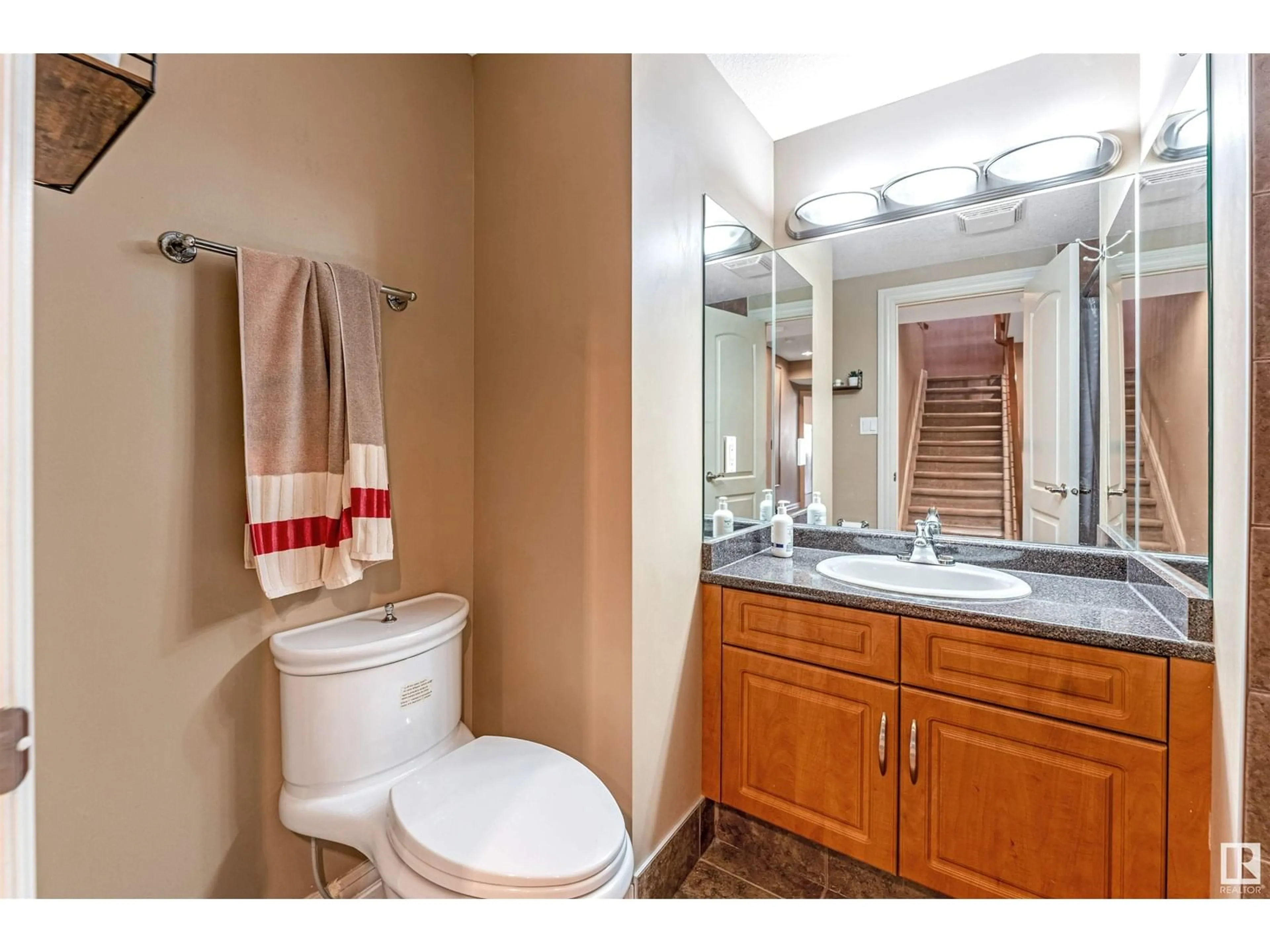 Standard bathroom, ceramic/tile floor for 6928 14 AV, Edmonton Alberta T6L1L3