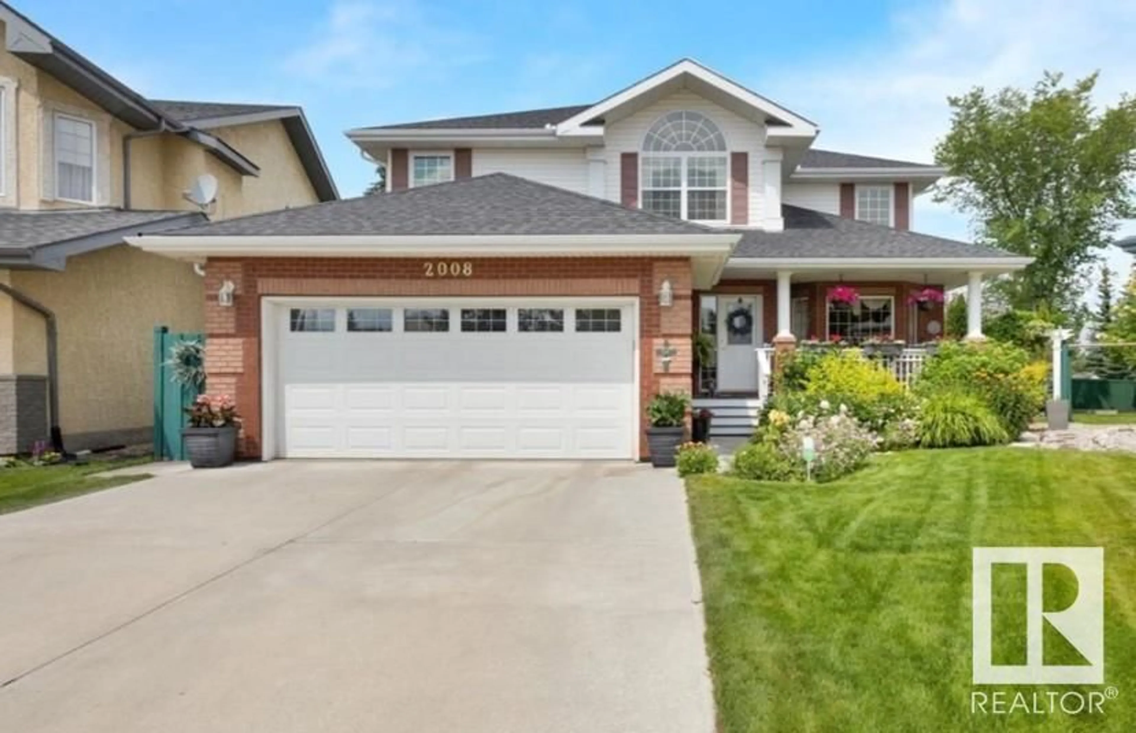 Home with vinyl exterior material, street for 2008 HADDOW DR, Edmonton Alberta T6R2P2