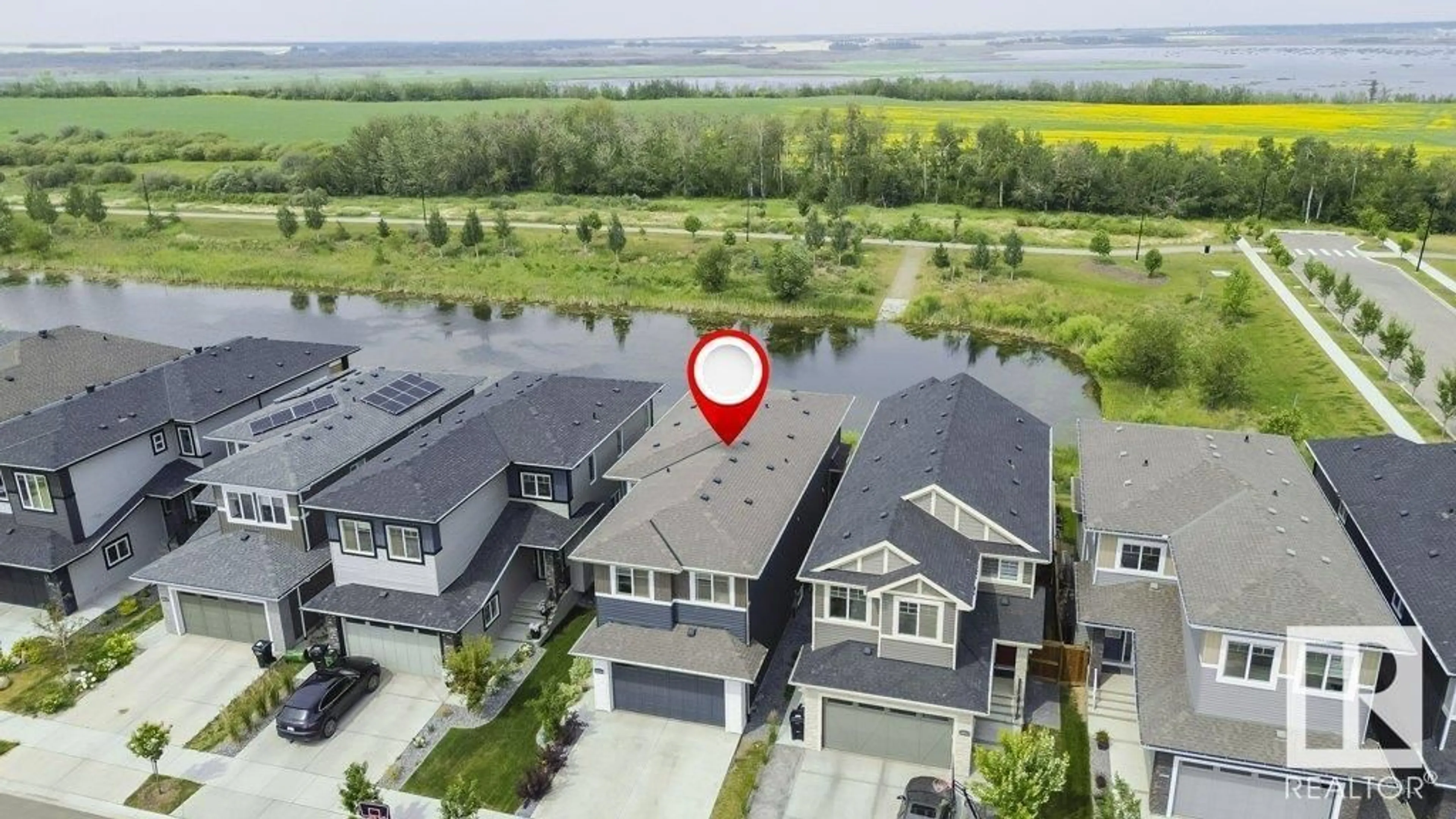 A pic from outside/outdoor area/front of a property/back of a property/a pic from drone, water/lake/river/ocean view for 20916 131 AV, Edmonton Alberta T5S0P4