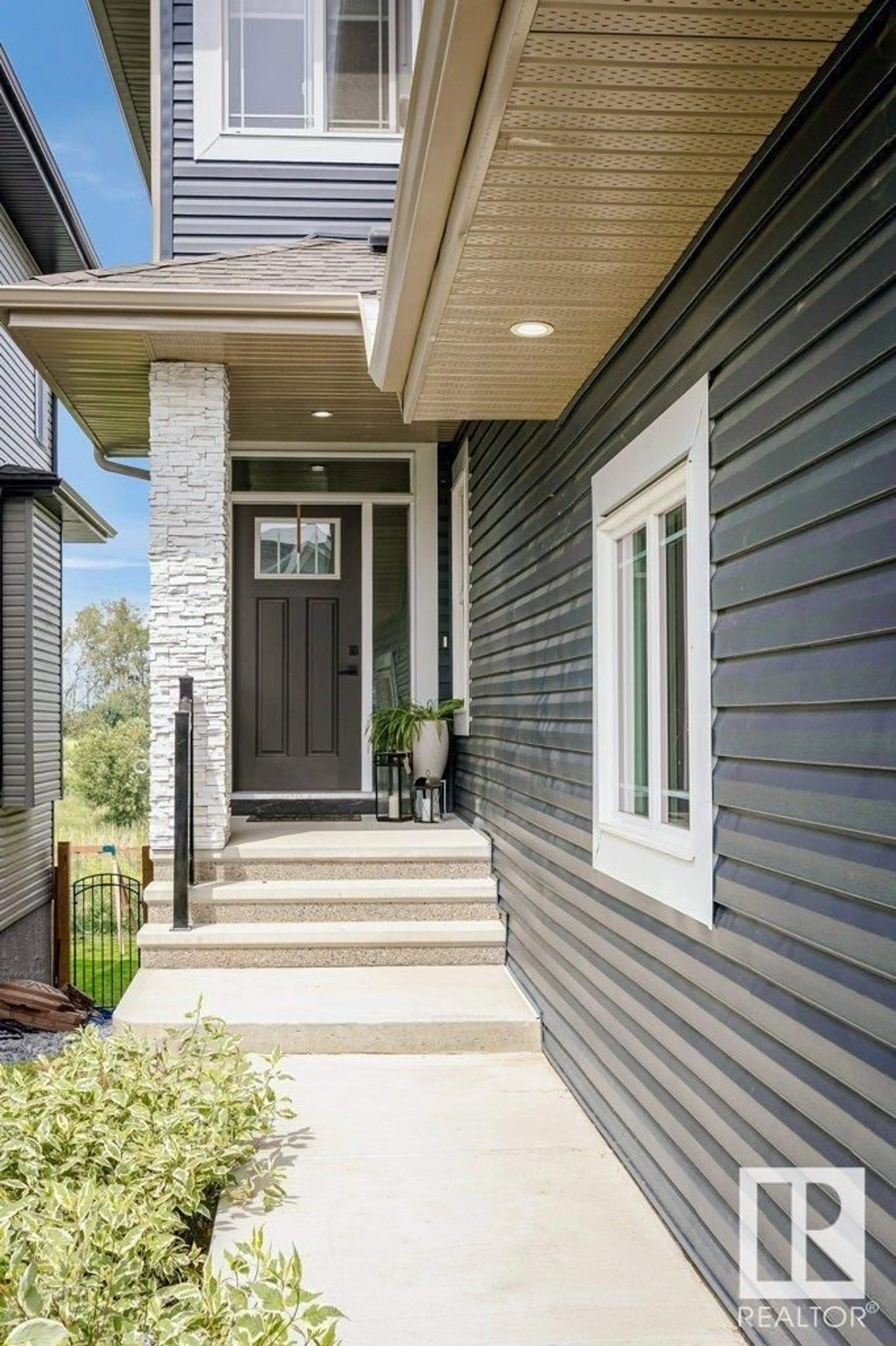 Home with brick exterior material, street for 20916 131 AV, Edmonton Alberta T5S0P4