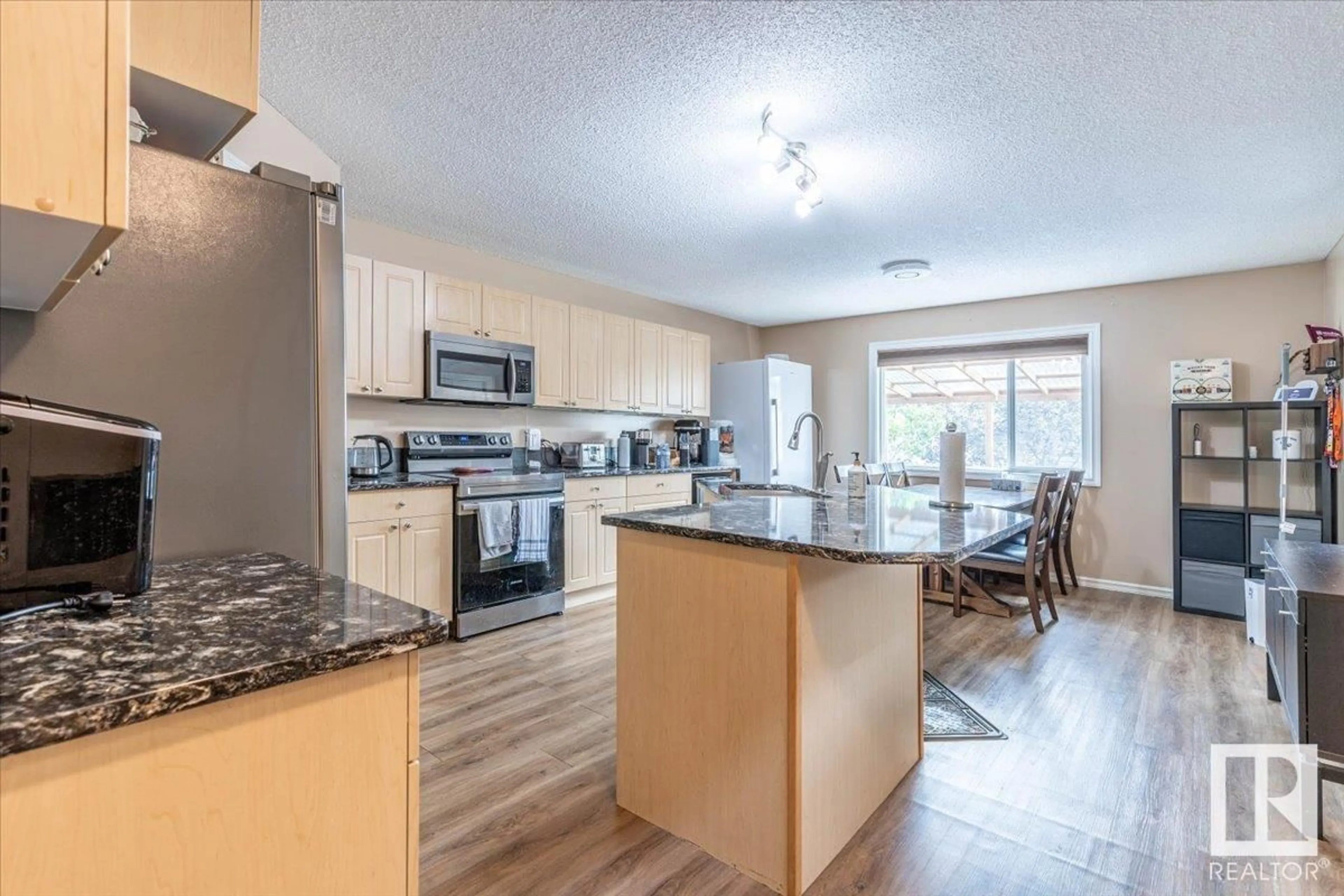 Open concept kitchen, unknown for 21335 91A AV, Edmonton Alberta T5T0W5