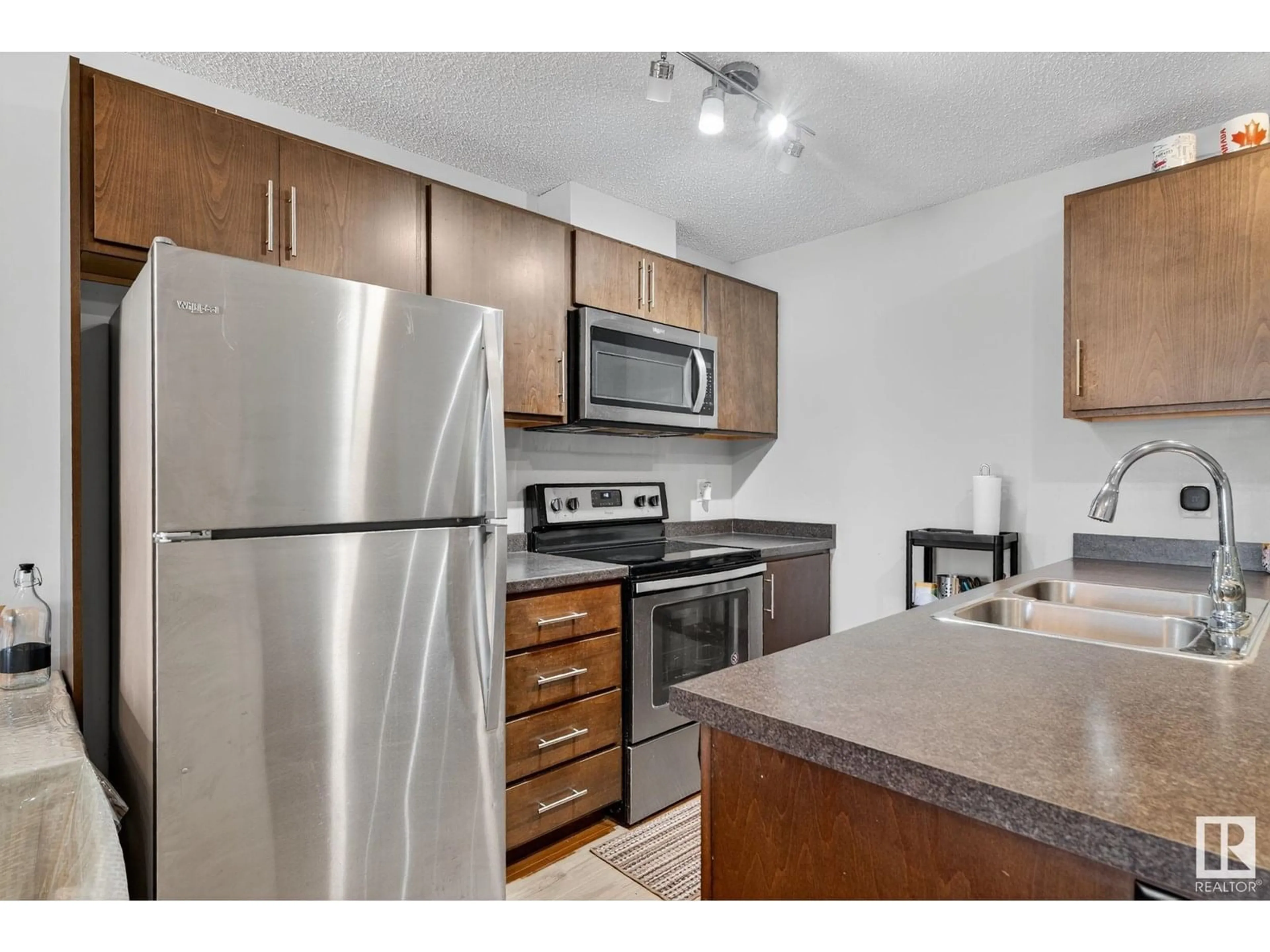 Standard kitchen, unknown for #110 - 5404 7 AV, Edmonton Alberta T6K2K4