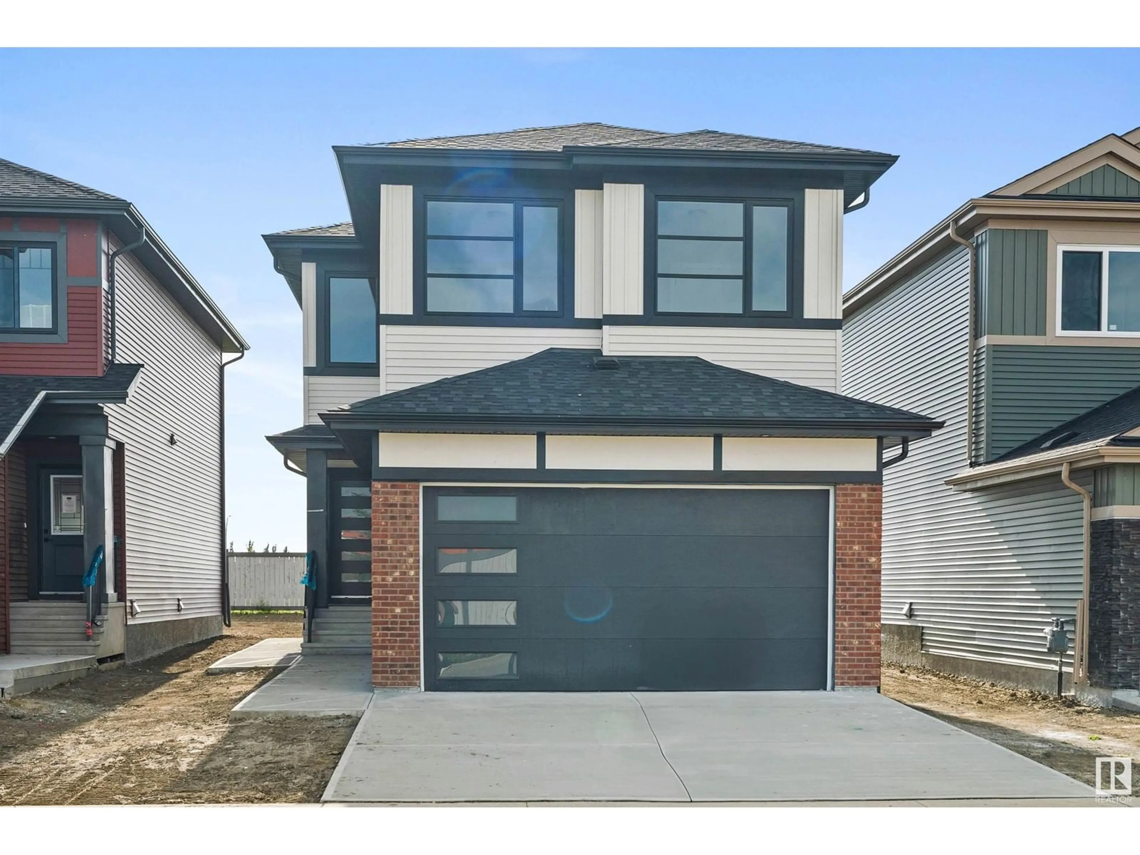 Home with brick exterior material, street for 9598 86 ST, Morinville Alberta T8R1S8