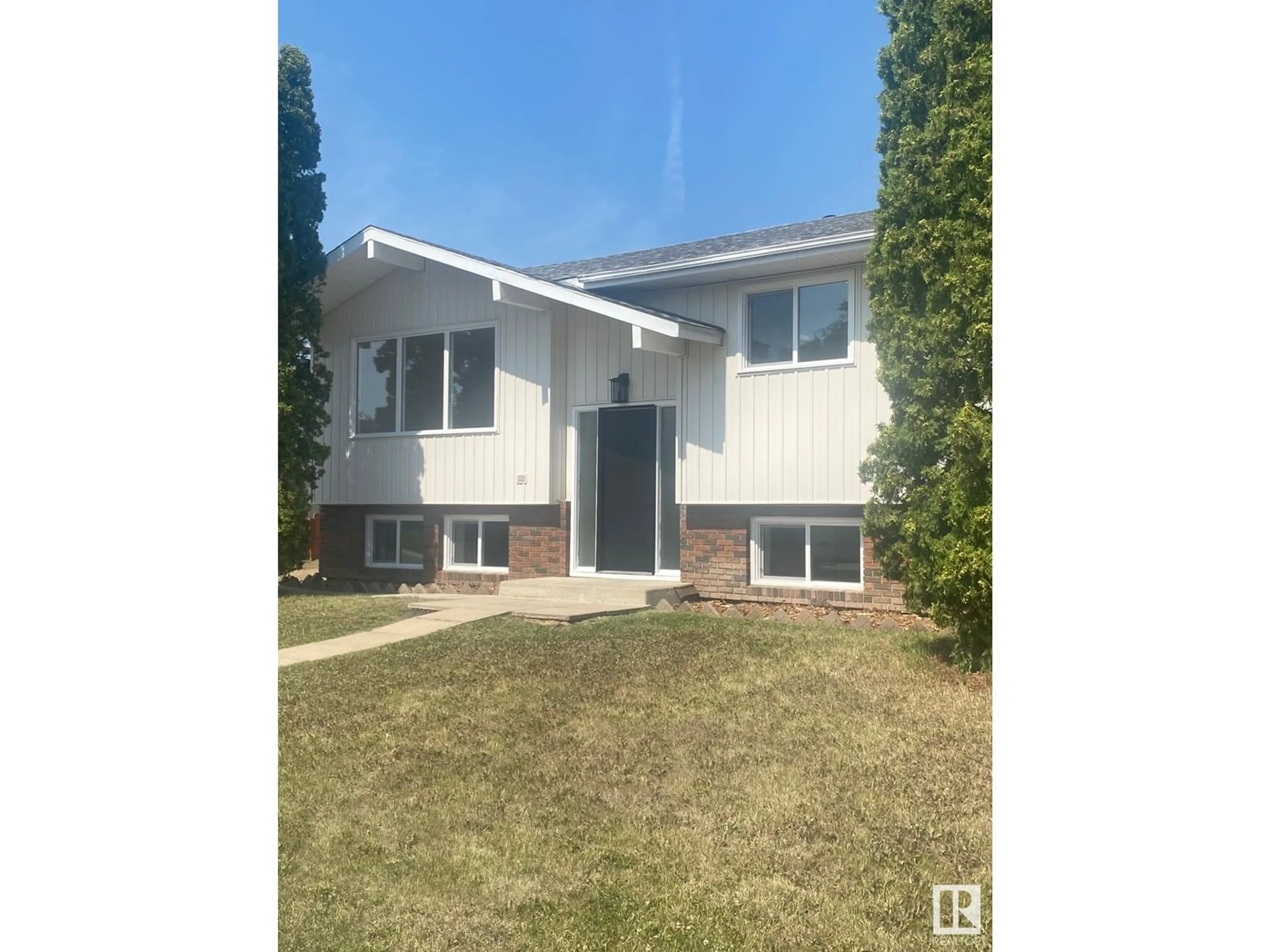 A pic from outside/outdoor area/front of a property/back of a property/a pic from drone, street for 11016 166 AVE, Edmonton Alberta T5X1Y3