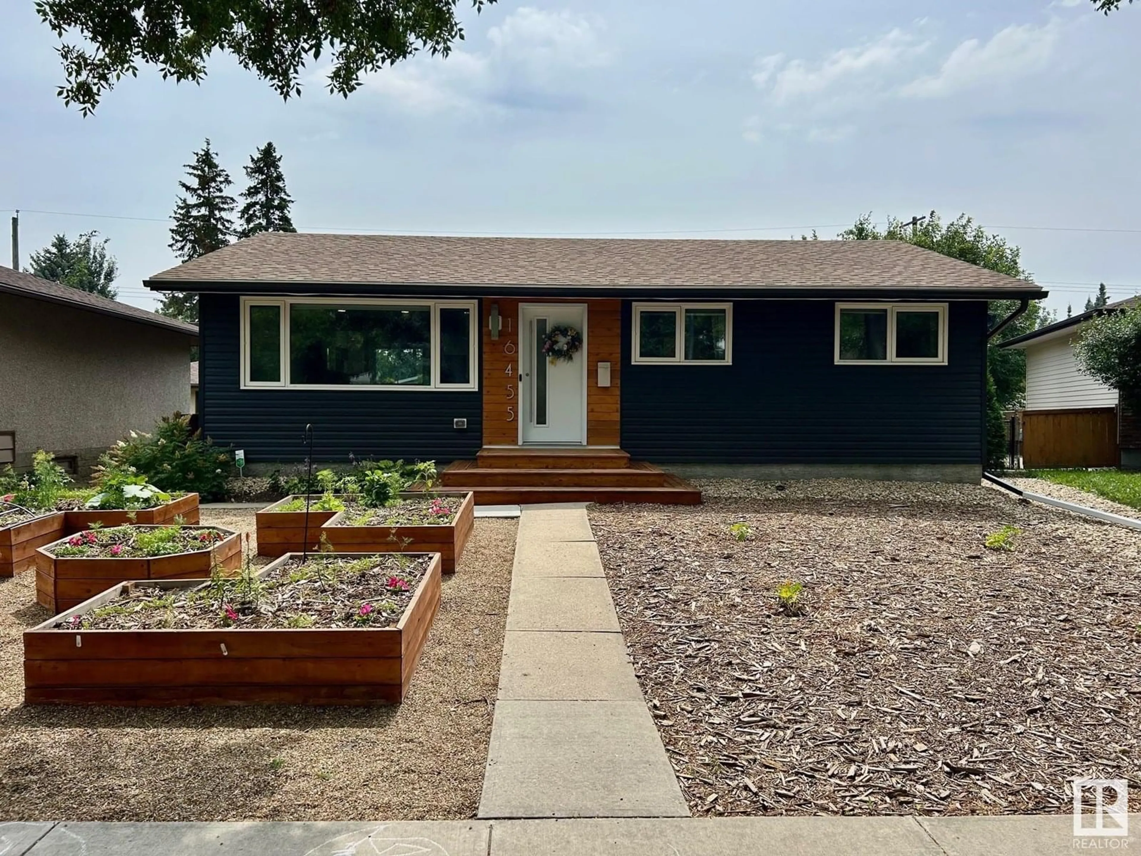 Home with vinyl exterior material, street for 16455 104A AV AV, Edmonton Alberta T5P0T3