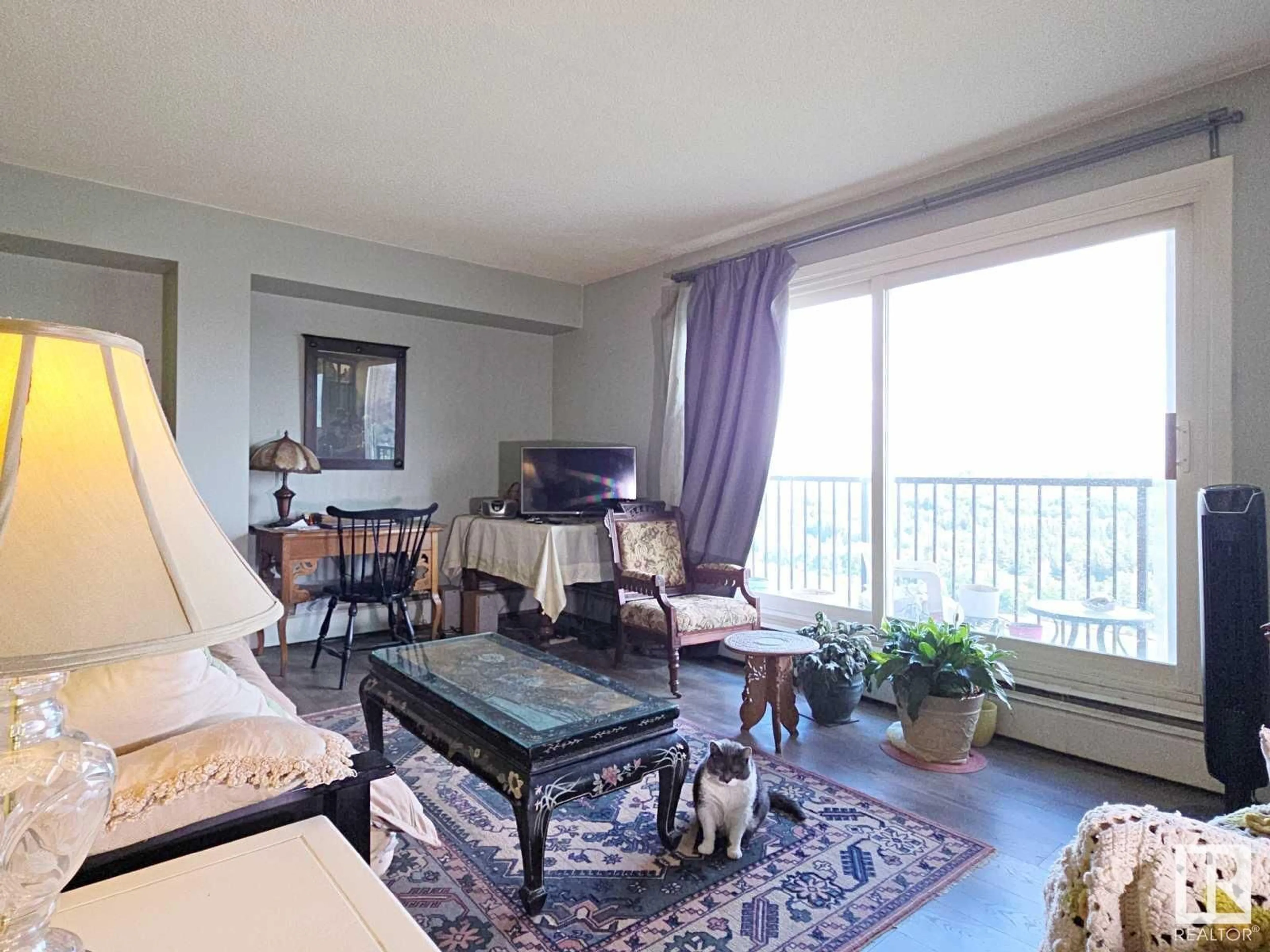 Living room with furniture, unknown for 8310 - 501 JASPER AV, Edmonton Alberta T5H3S3