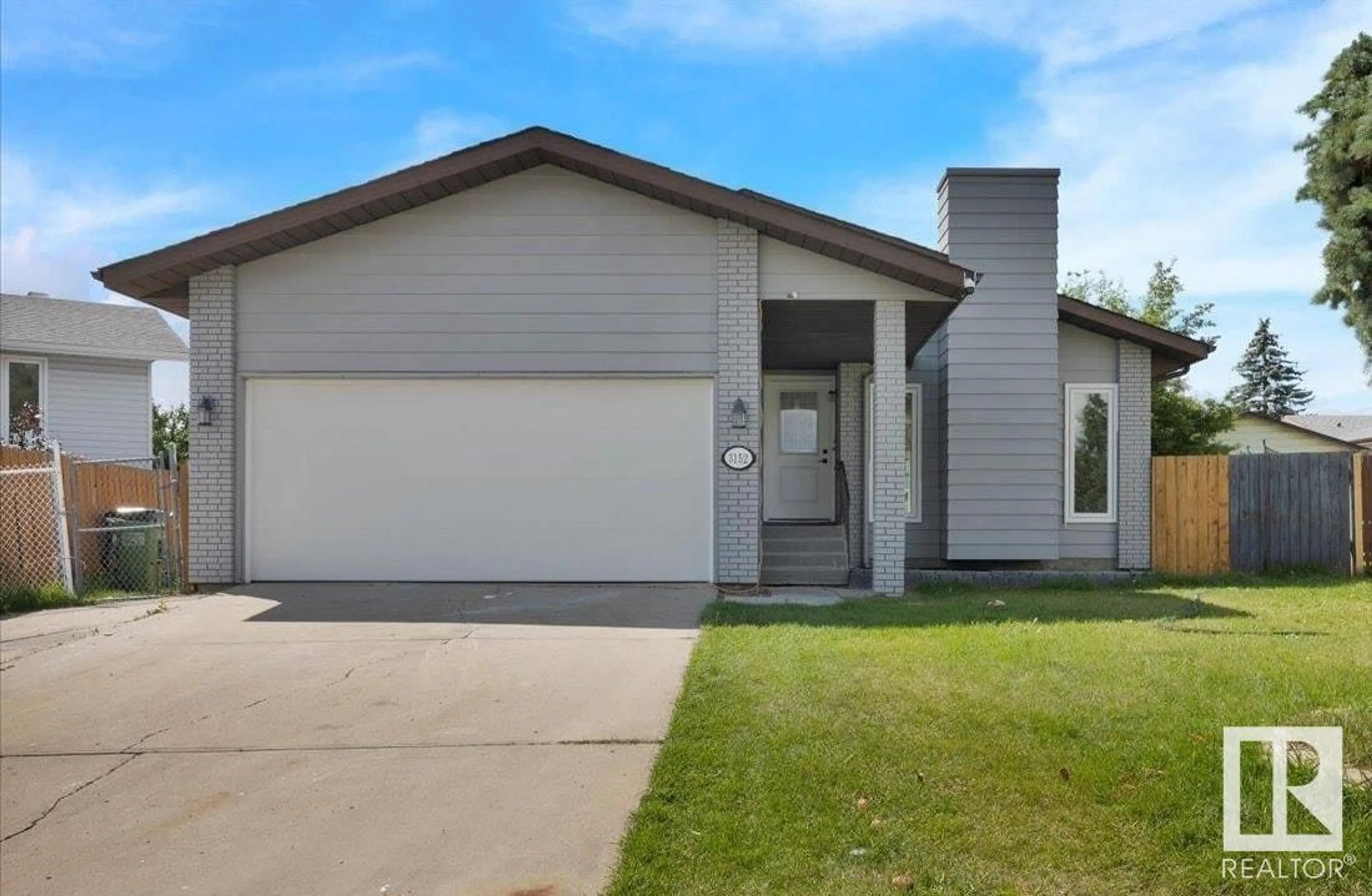 Home with vinyl exterior material, street for 3152 78 ST, Edmonton Alberta T6K2Y2