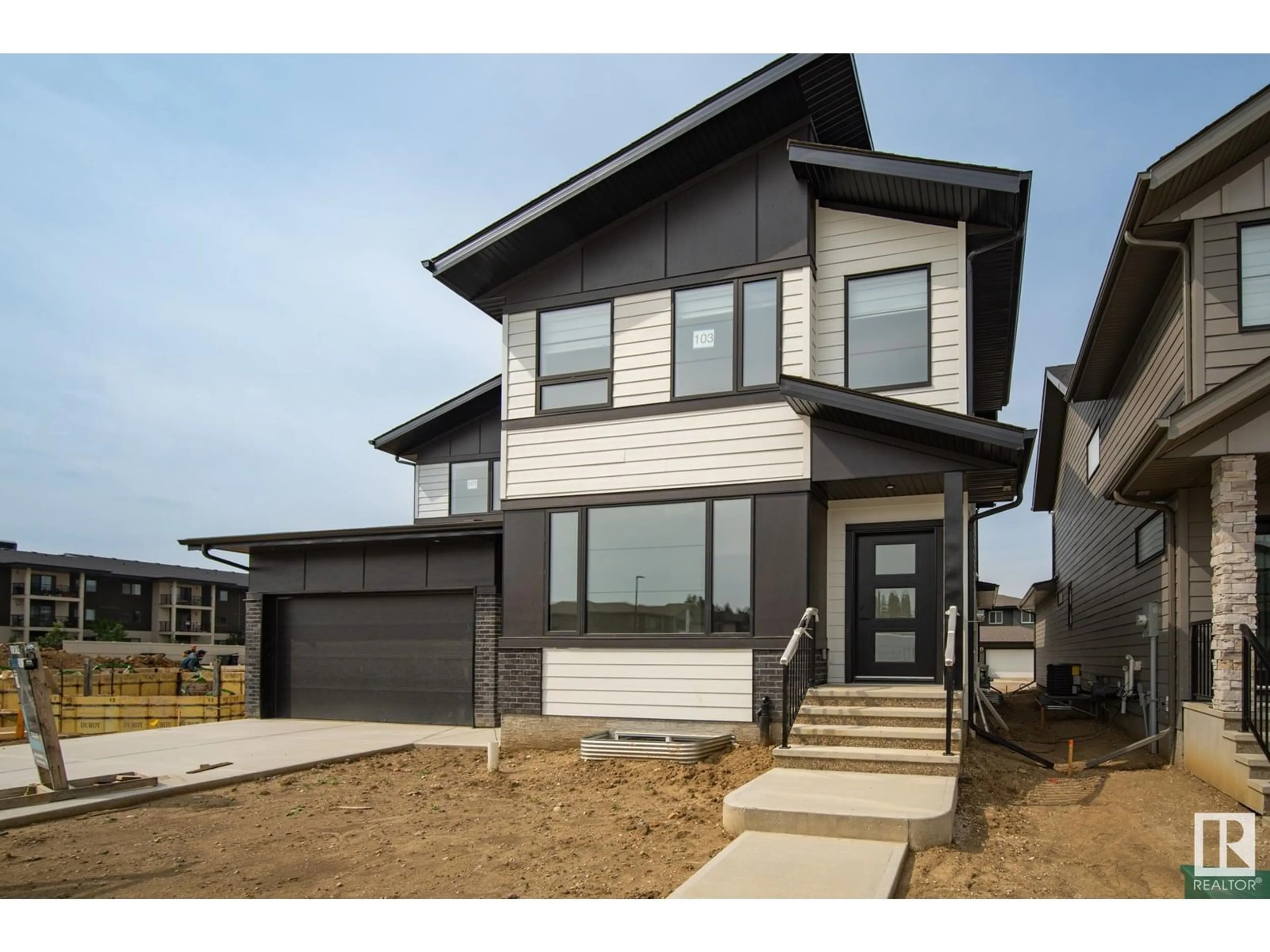 Home with vinyl exterior material, street for 103 NEWBURY CI, Sherwood Park Alberta T8B0E8