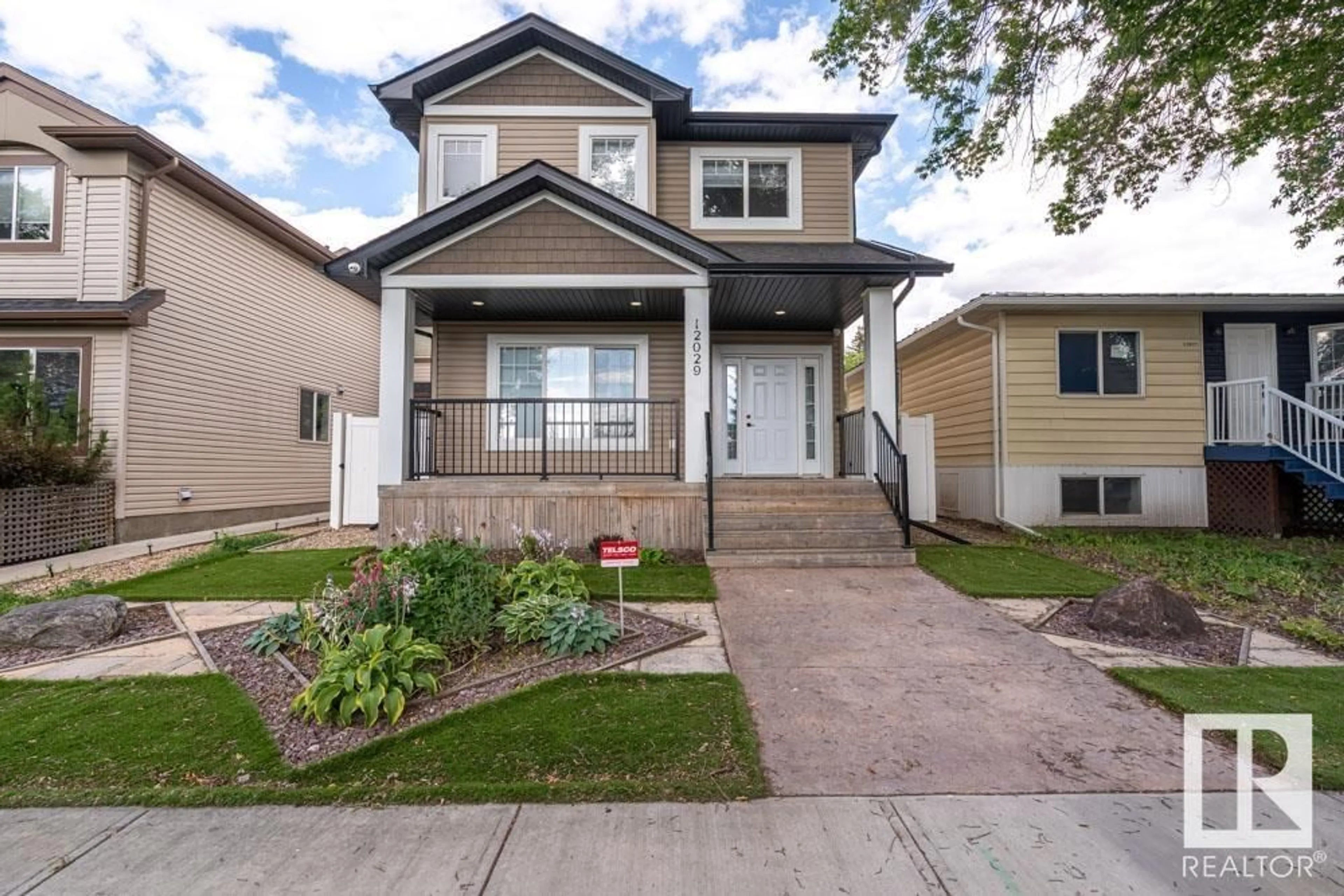 Home with vinyl exterior material, street for NW - 12029 69 ST, Edmonton Alberta T5B1S7
