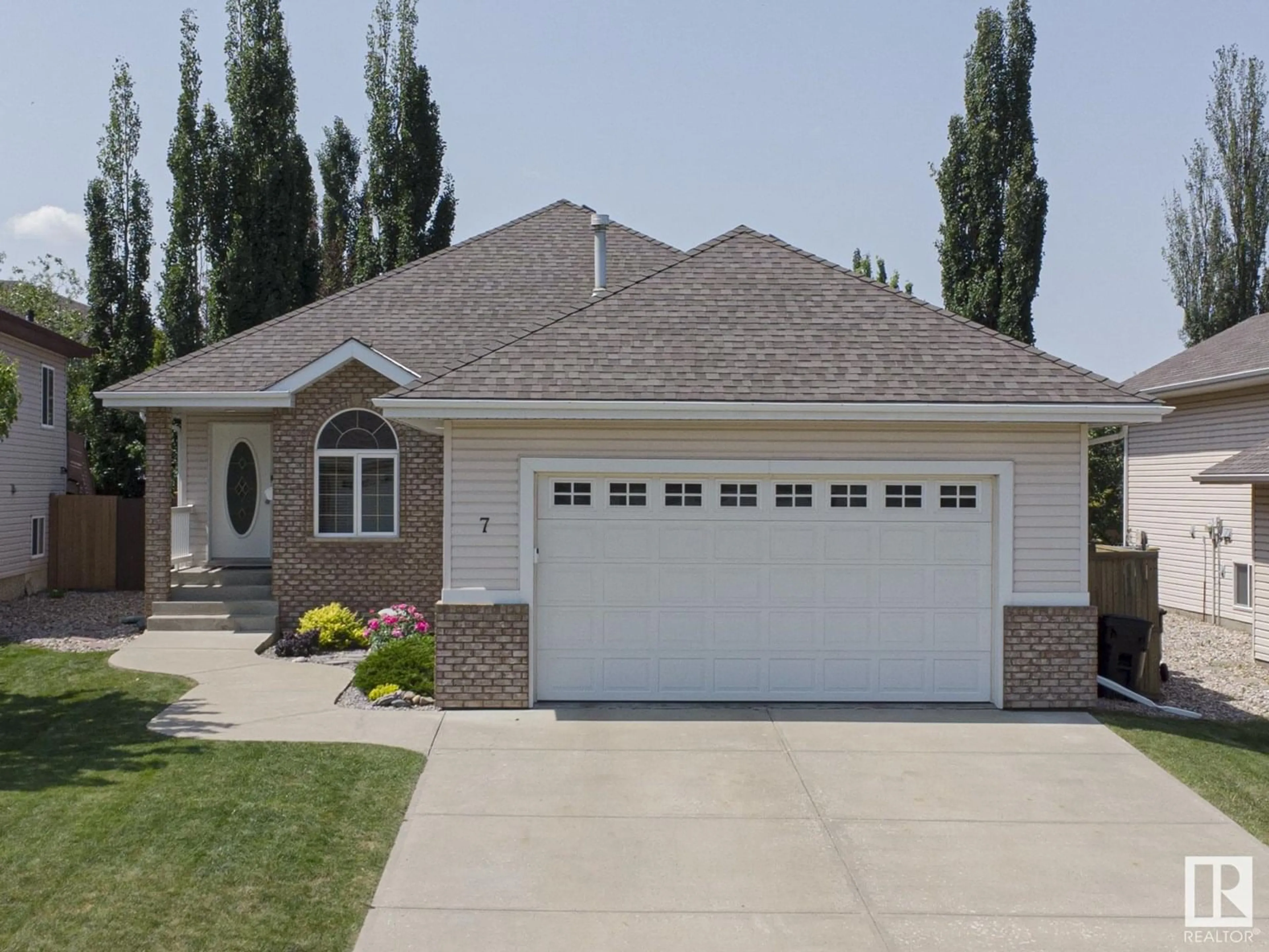 Home with vinyl exterior material, street for 7 CHELSEA WY, Sherwood Park Alberta T8H2G6