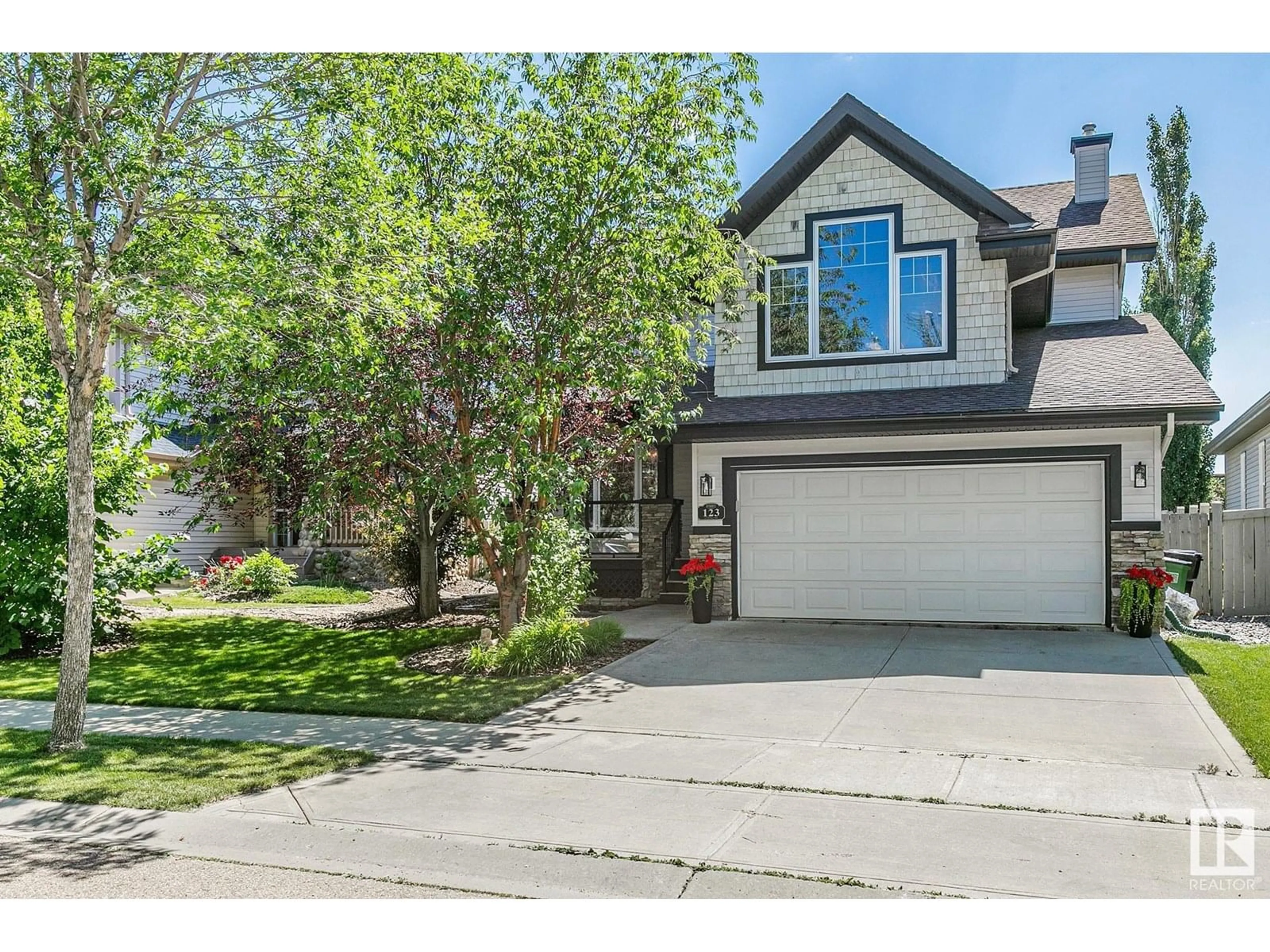 Home with vinyl exterior material, street for 123 CALDWELL WY, Edmonton Alberta T6M2X1