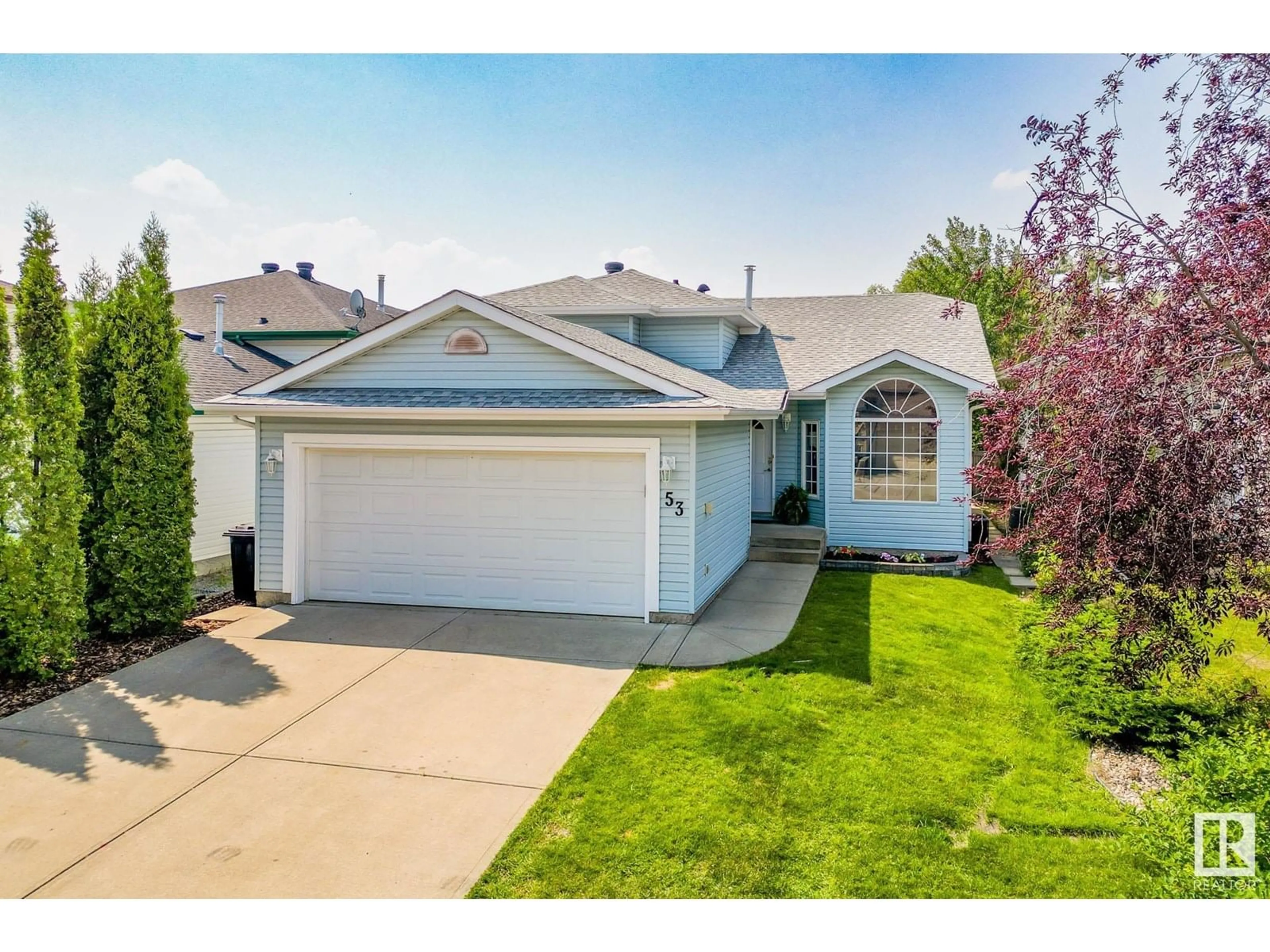 Home with vinyl exterior material, street for 53 WESTWOOD GR, Fort Saskatchewan Alberta T8L4G3