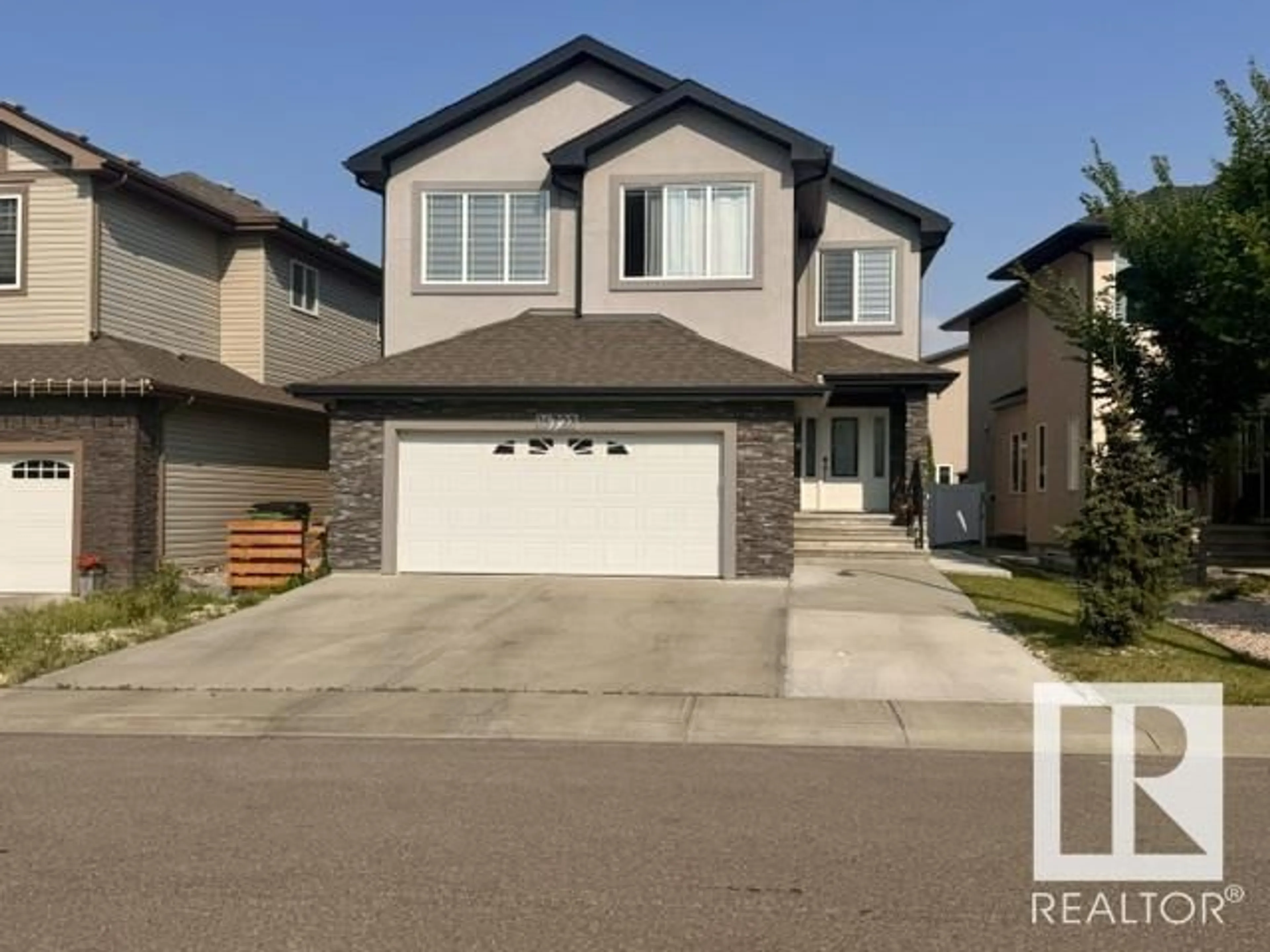 Home with vinyl exterior material, street for NW - 16123 61 ST, Edmonton Alberta T5Y0W6