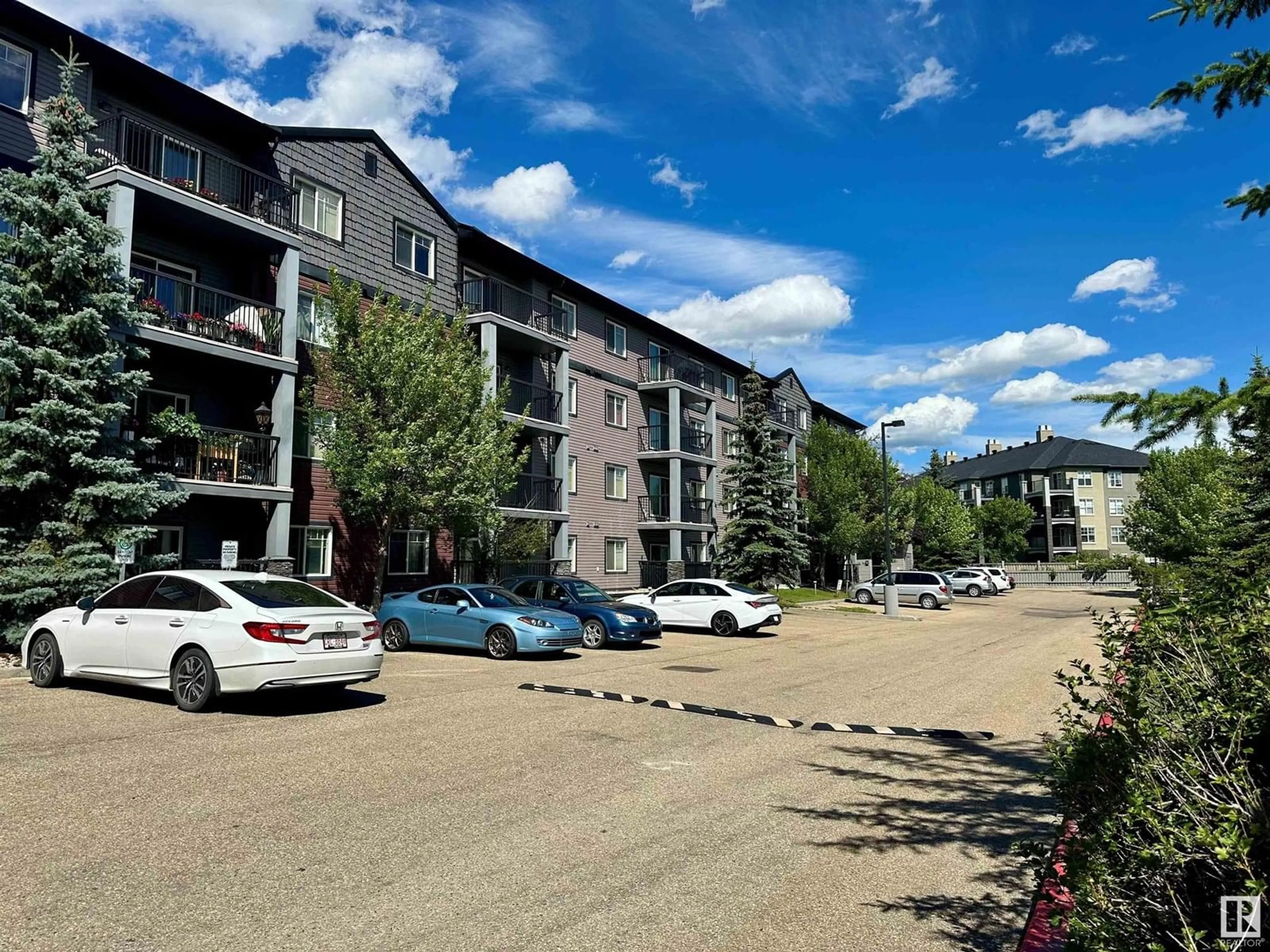 A pic from outside/outdoor area/front of a property/back of a property/a pic from drone, street for #318 - 646 MCALLISTER LO, Edmonton Alberta T6W0B5