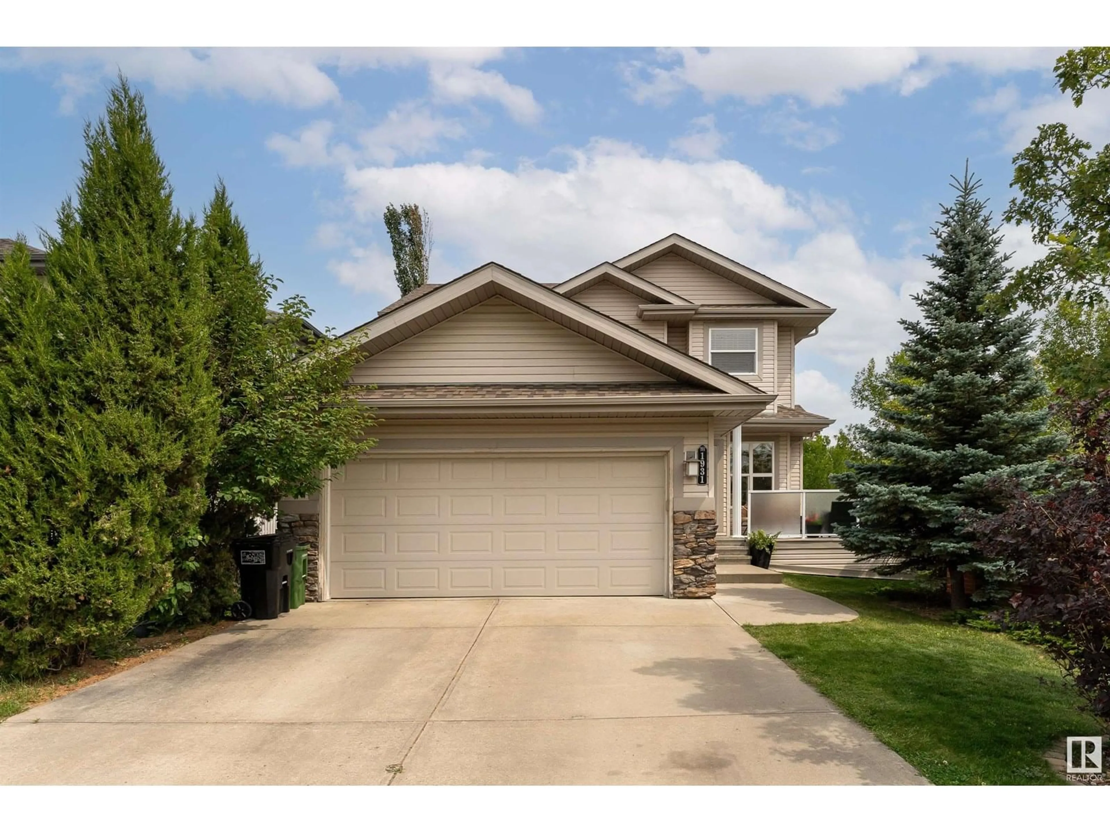Home with vinyl exterior material, street for SW - 1931 125 ST, Edmonton Alberta T6W0A1