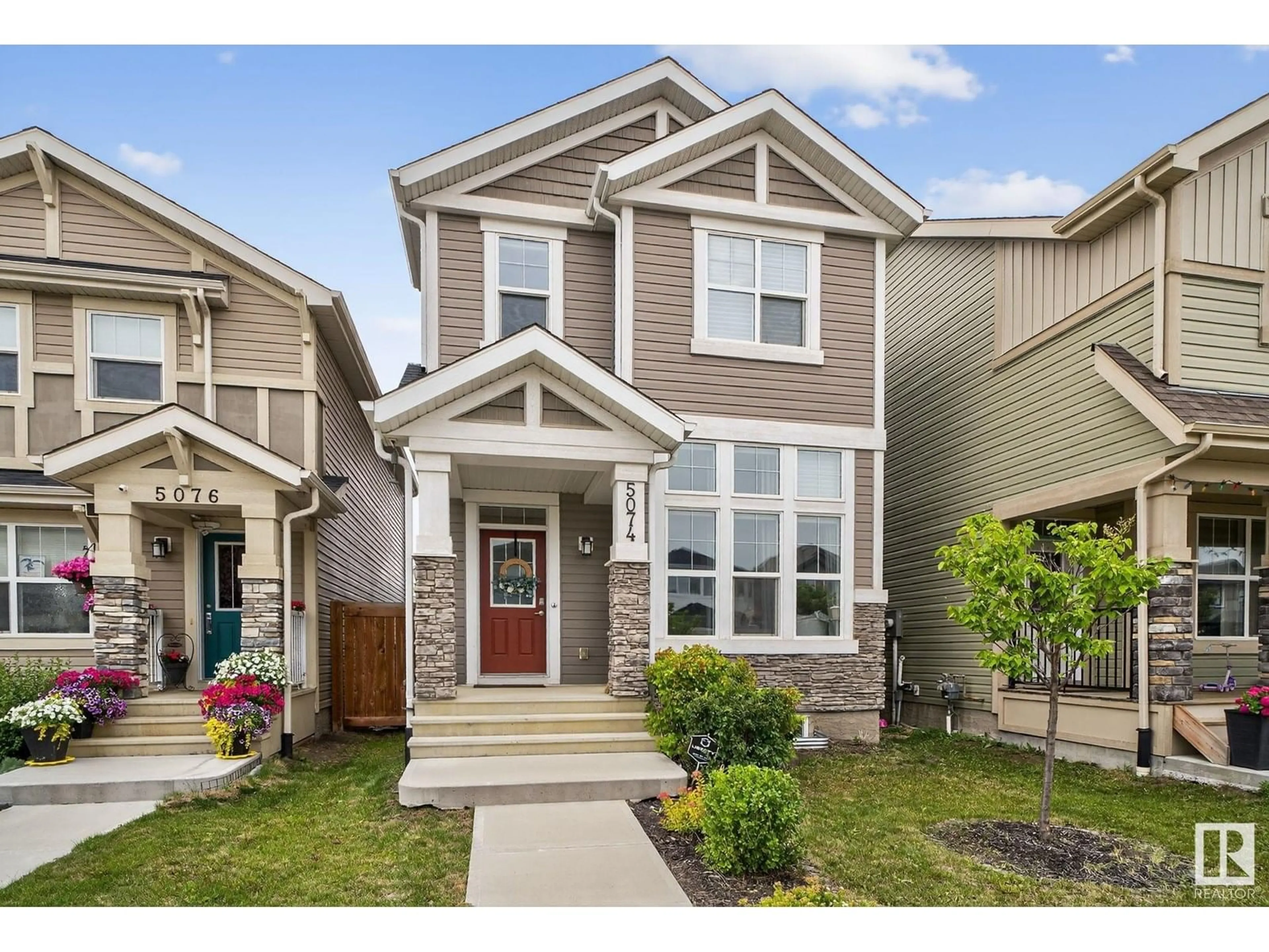 Home with vinyl exterior material, street for 5074 ANDISON CL, Edmonton Alberta T6W3T4