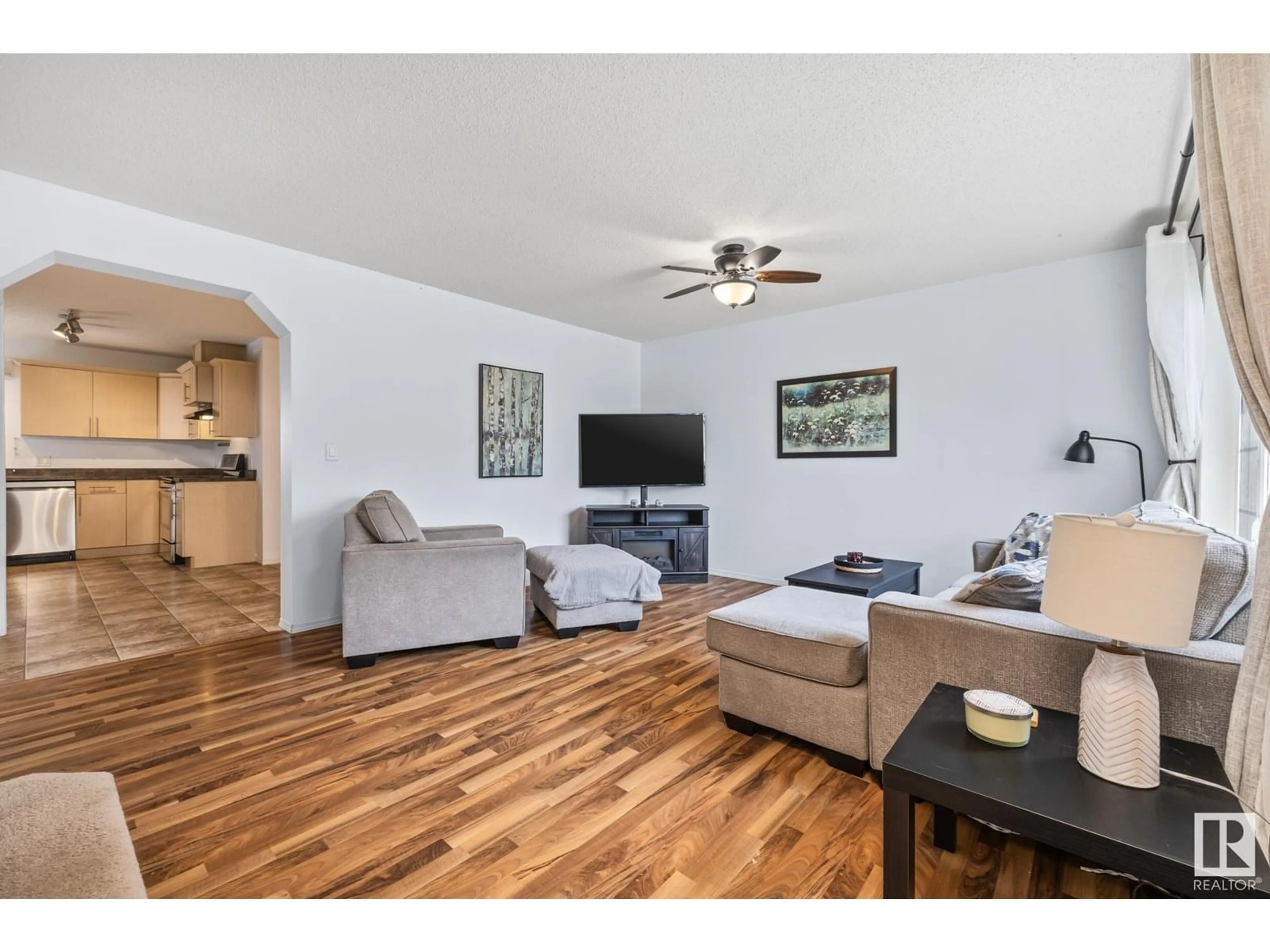 Living room with furniture, wood/laminate floor for 278 AVENA CI, Leduc Alberta T9E0L0