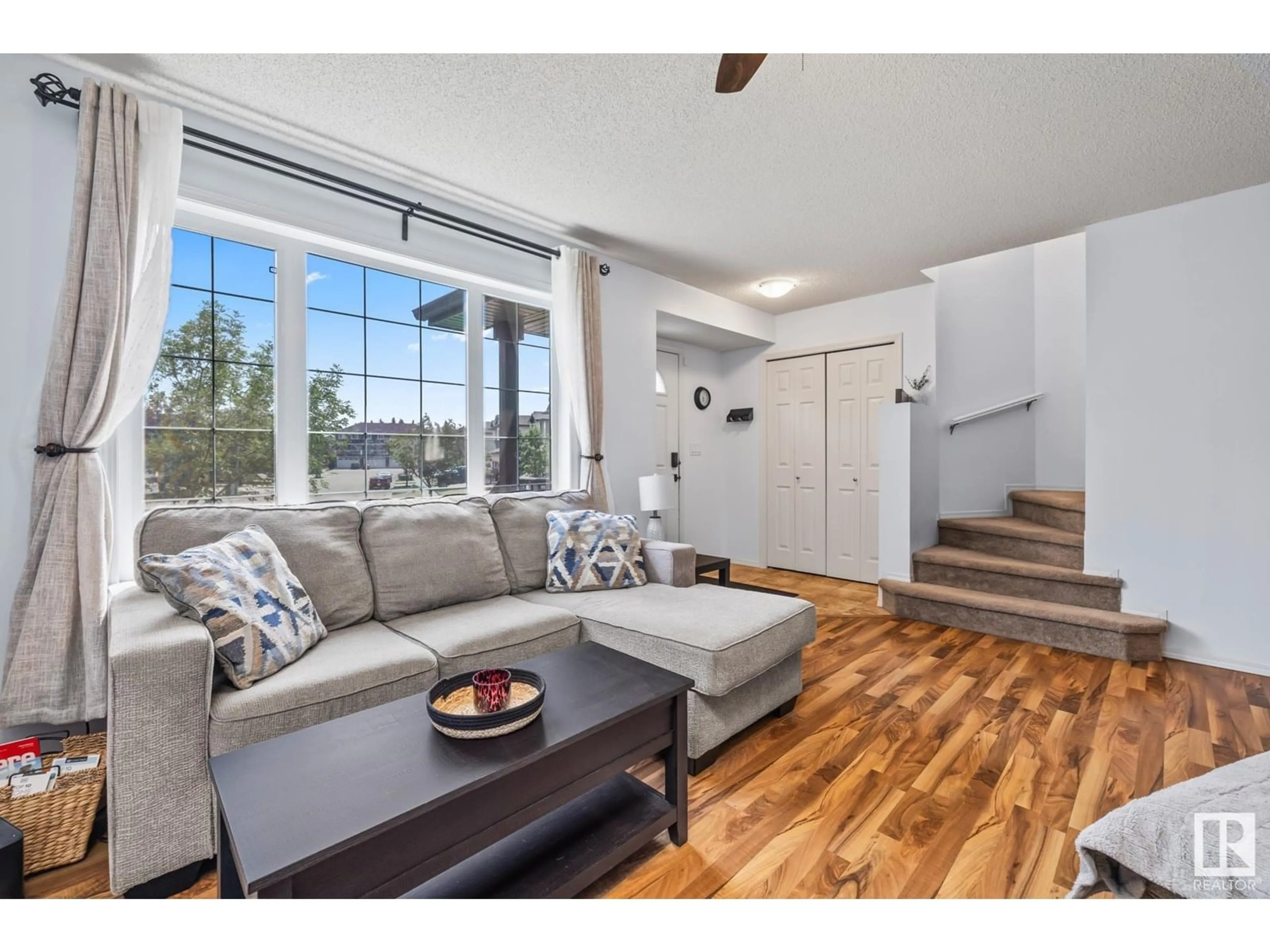 Living room with furniture, wood/laminate floor for 278 AVENA CI, Leduc Alberta T9E0L0