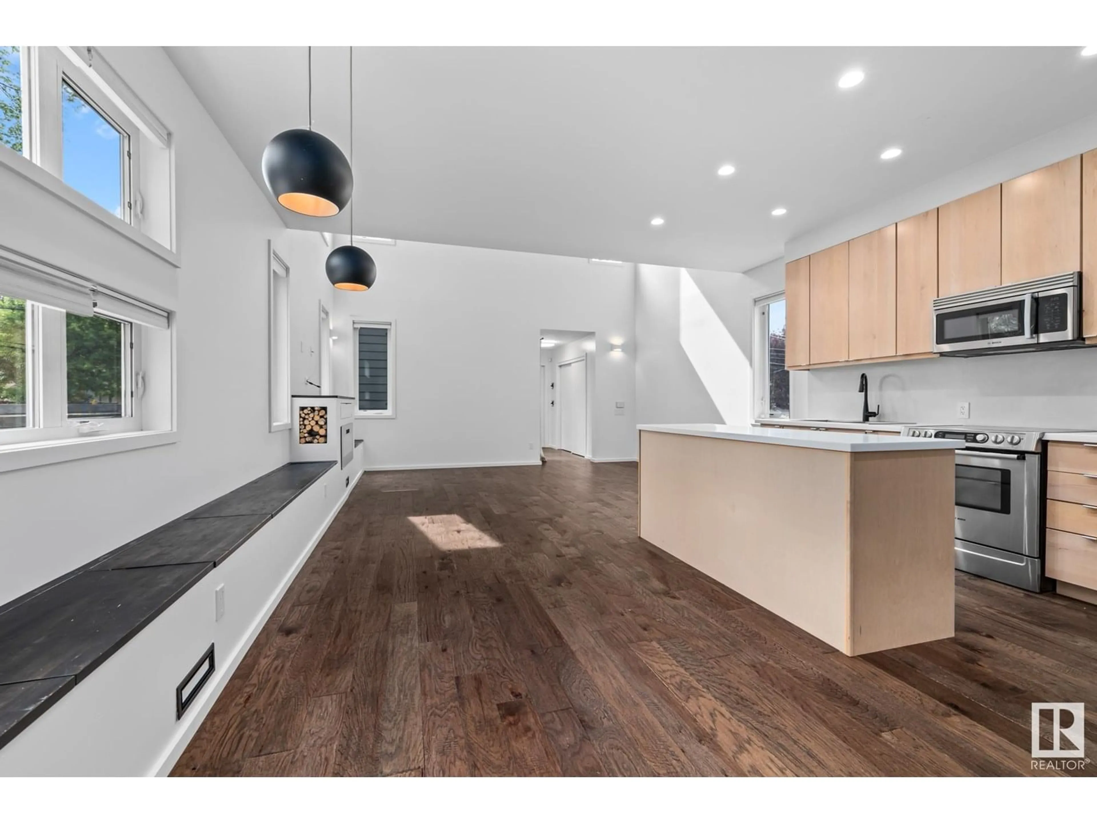 Open concept kitchen, wood/laminate floor for NW - 11402 66 ST, Edmonton Alberta T5B1H8
