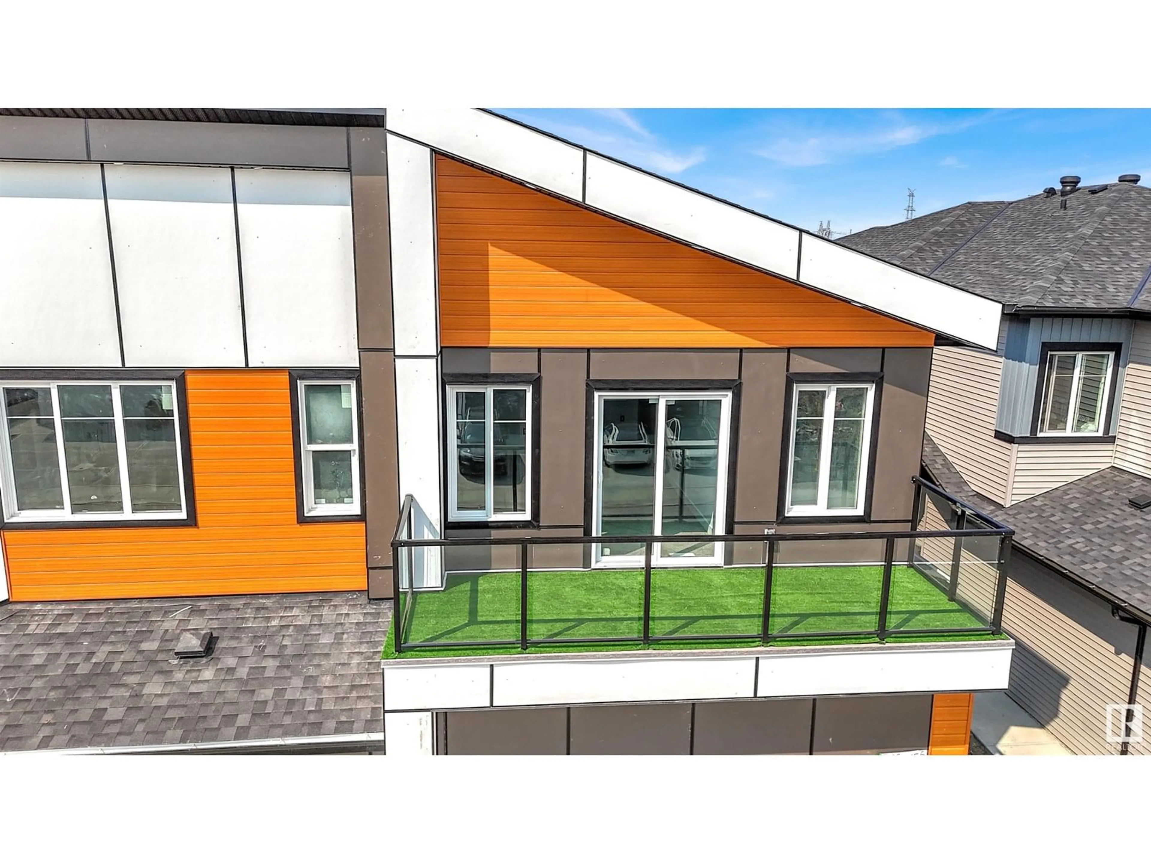 Home with vinyl exterior material, street for 2020 155 AV, Edmonton Alberta T5Y4H9