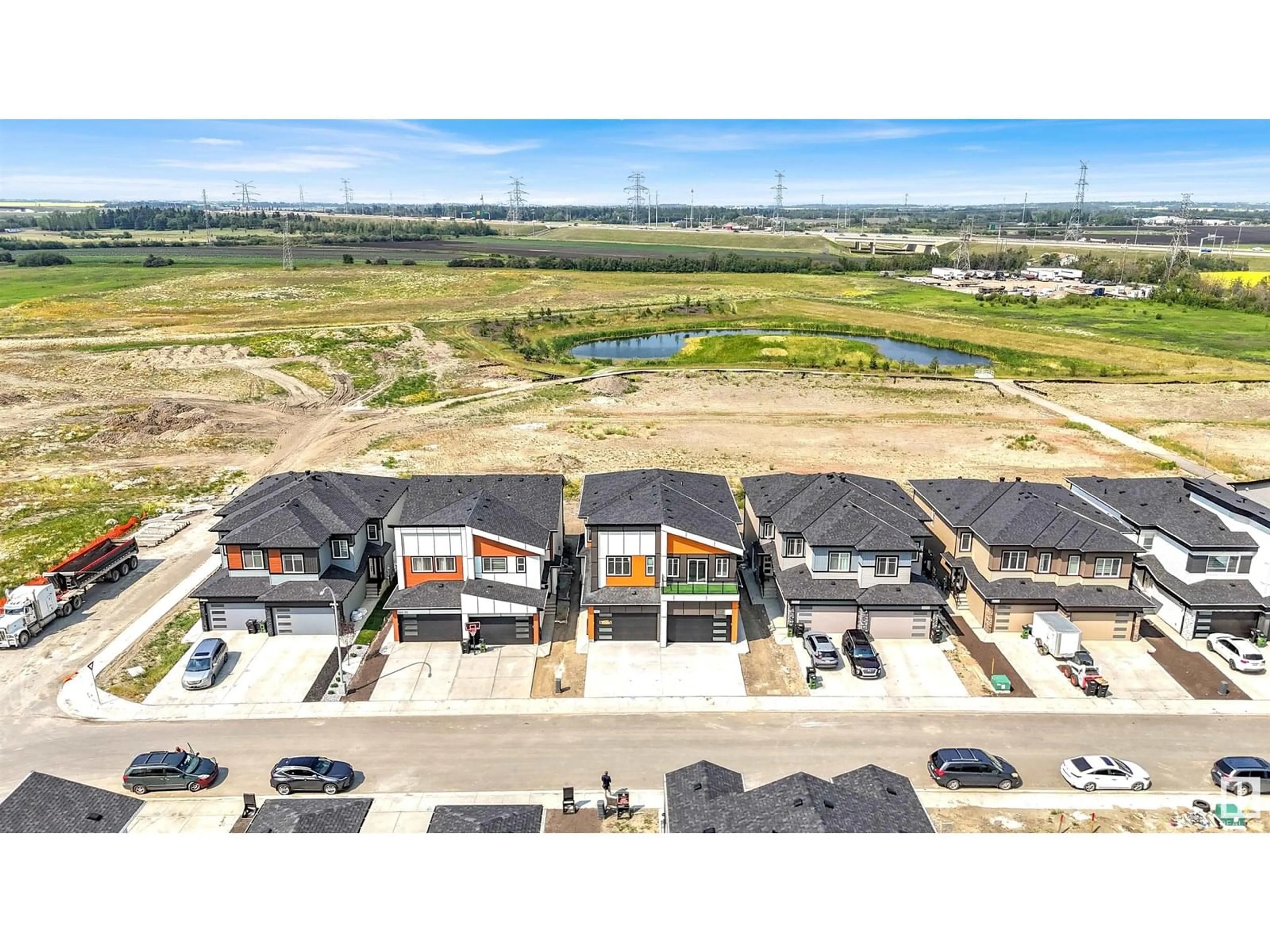 A pic from outside/outdoor area/front of a property/back of a property/a pic from drone, water/lake/river/ocean view for 2020 155 AV, Edmonton Alberta T5Y4H9