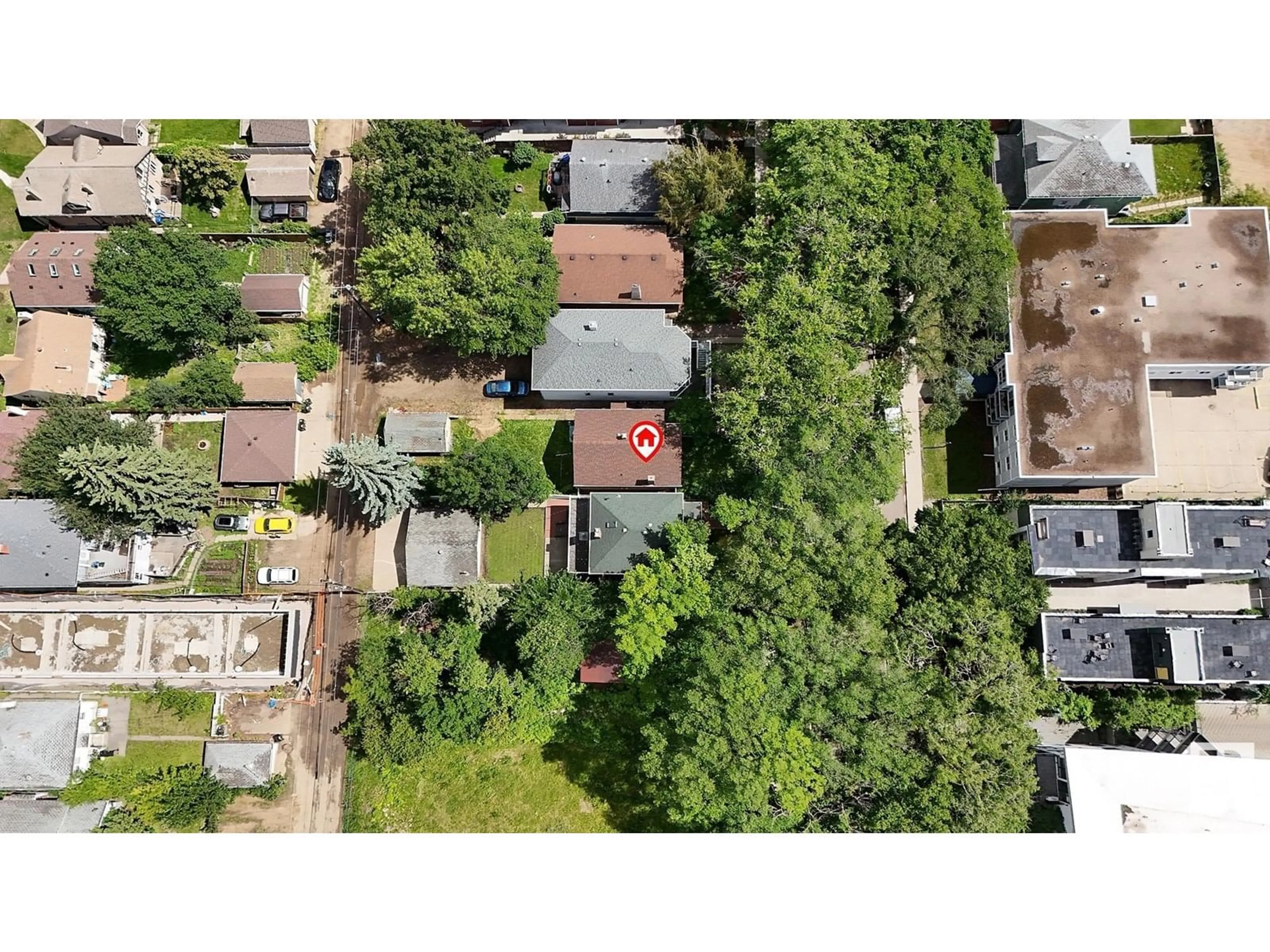 A pic from outside/outdoor area/front of a property/back of a property/a pic from drone, street for 10820 83 AV, Edmonton Alberta T6E2E7