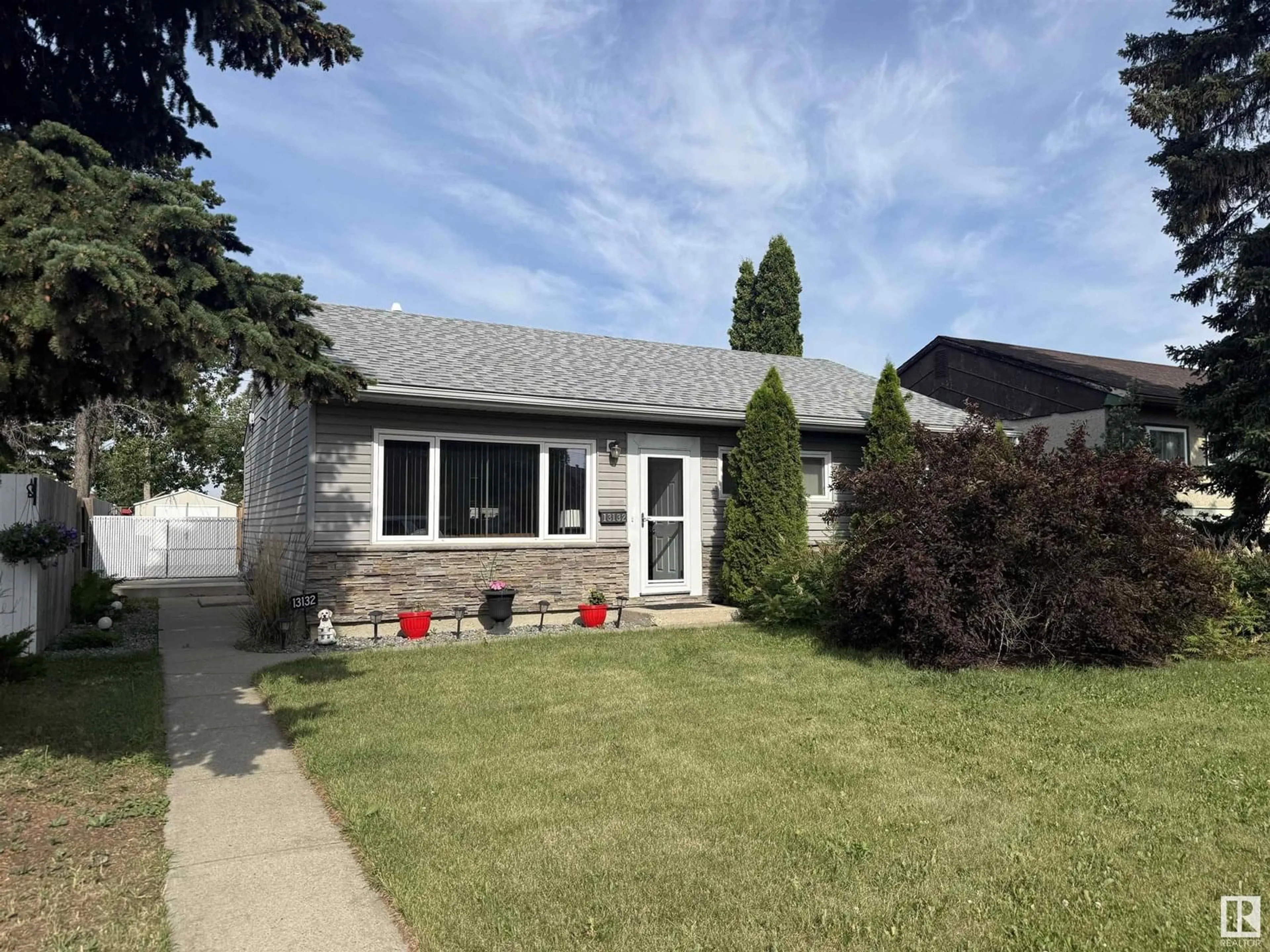 Home with vinyl exterior material, street for NW - 13132 135 ST, Edmonton Alberta T5L1Y5