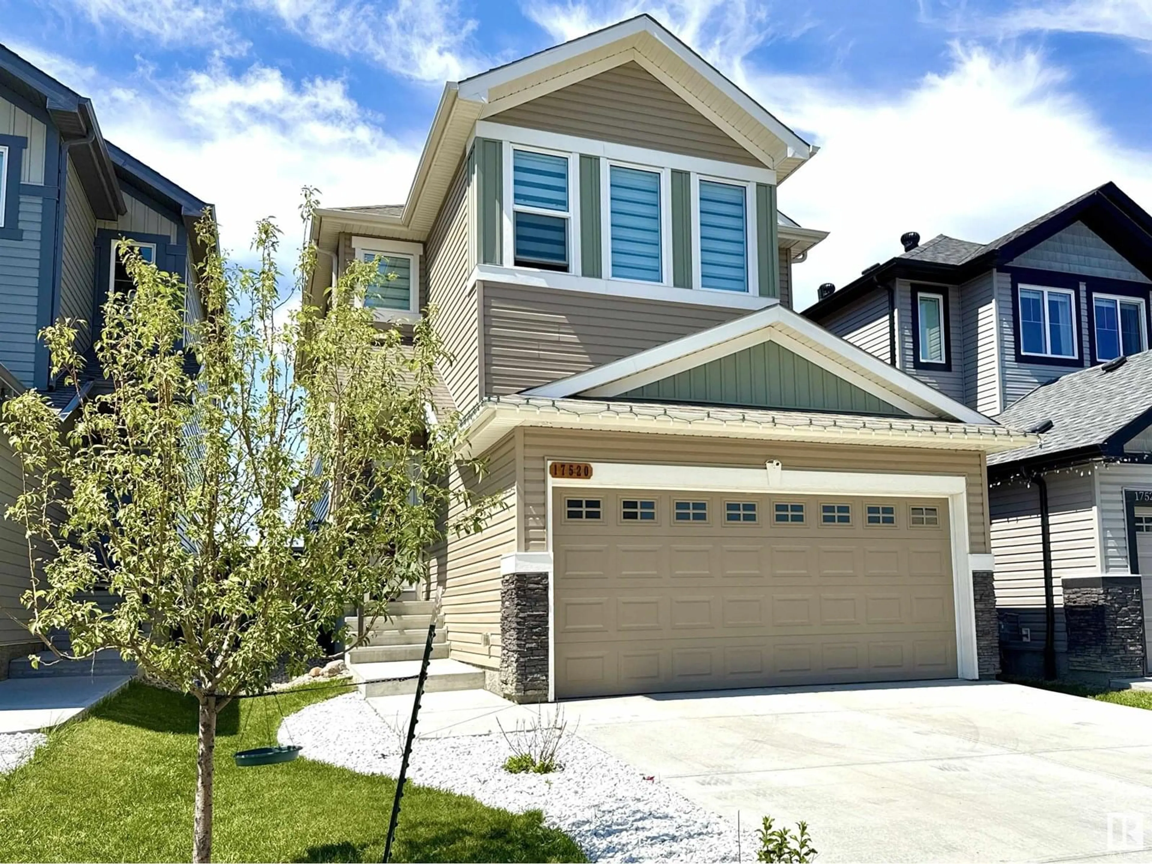 Home with vinyl exterior material, street for 17520 49 ST, Edmonton Alberta T5Y4C6
