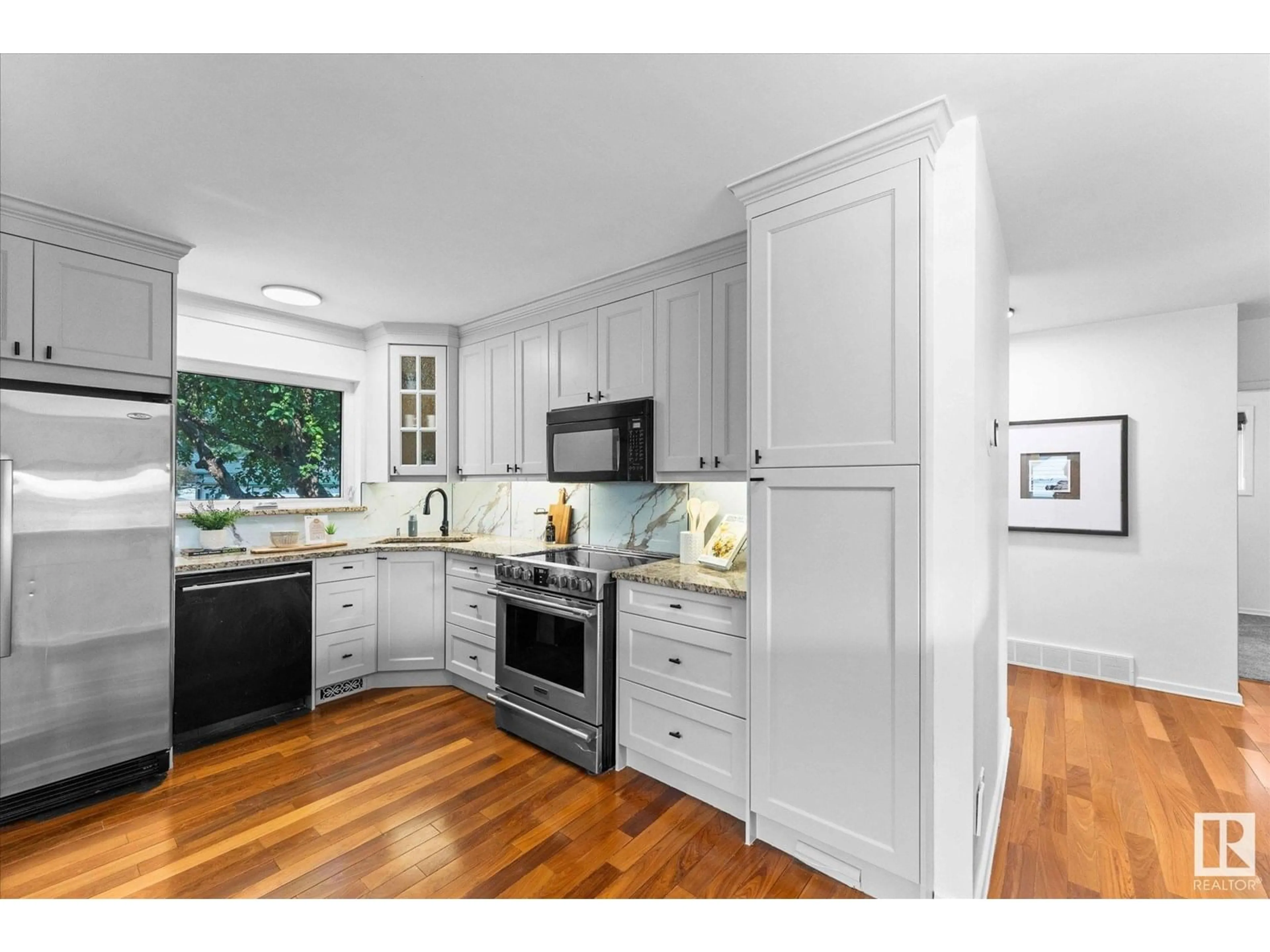 Open concept kitchen, unknown for NW - 10112 81 ST, Edmonton Alberta T6A3K5