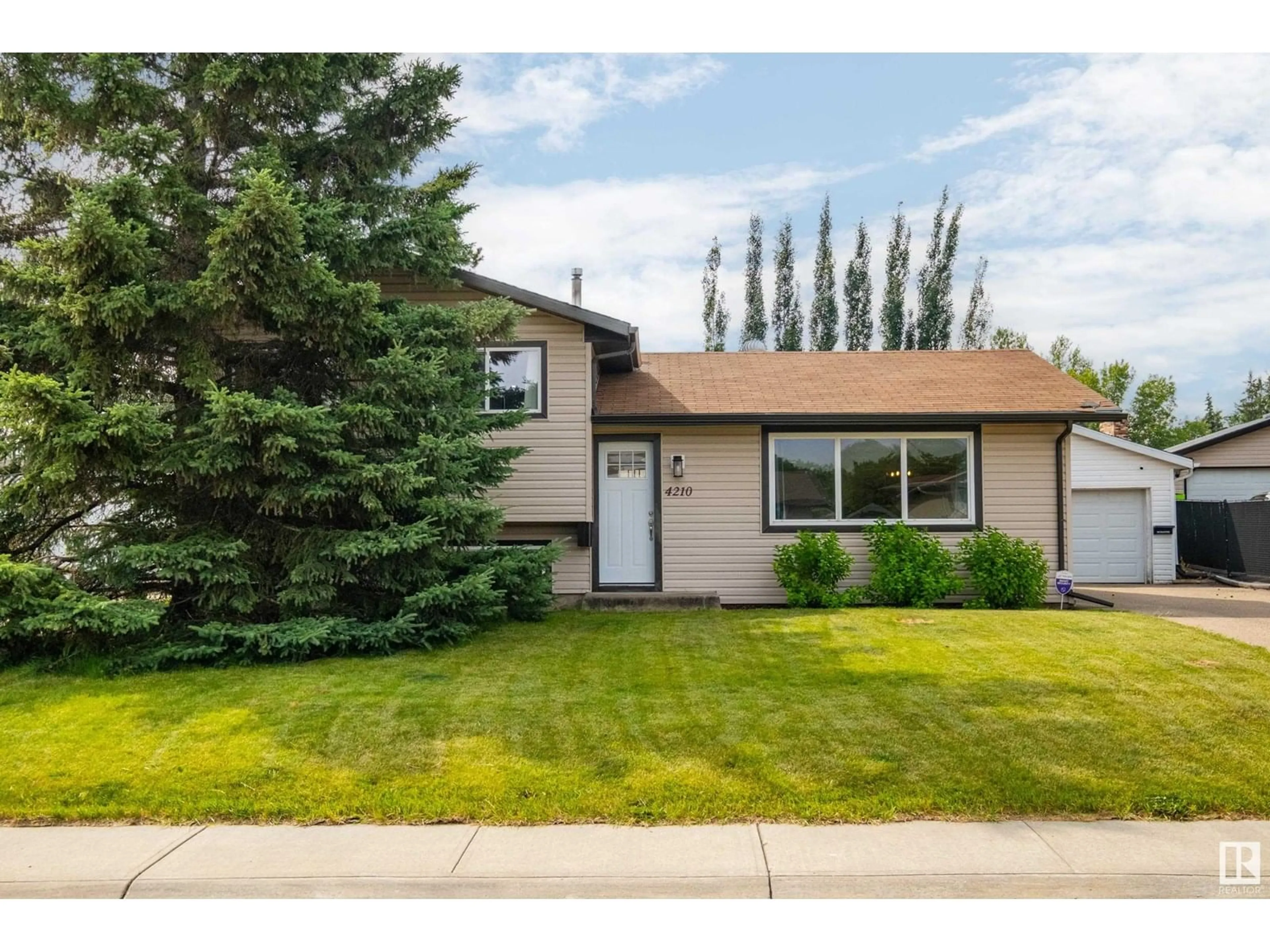 Home with vinyl exterior material, street for 4210 53 AV, Stony Plain Alberta T7Z1G5