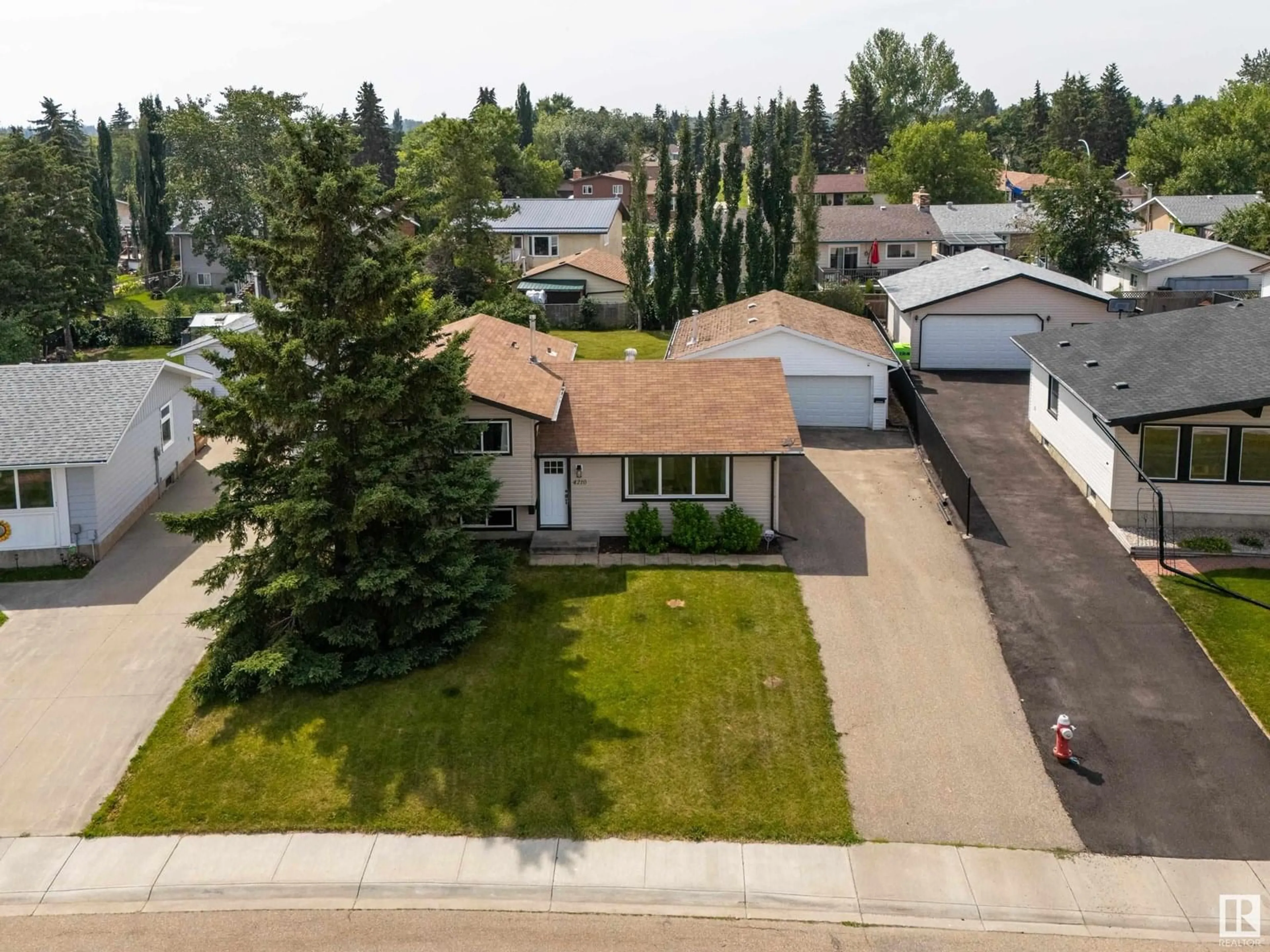 A pic from outside/outdoor area/front of a property/back of a property/a pic from drone, street for 4210 53 AV, Stony Plain Alberta T7Z1G5