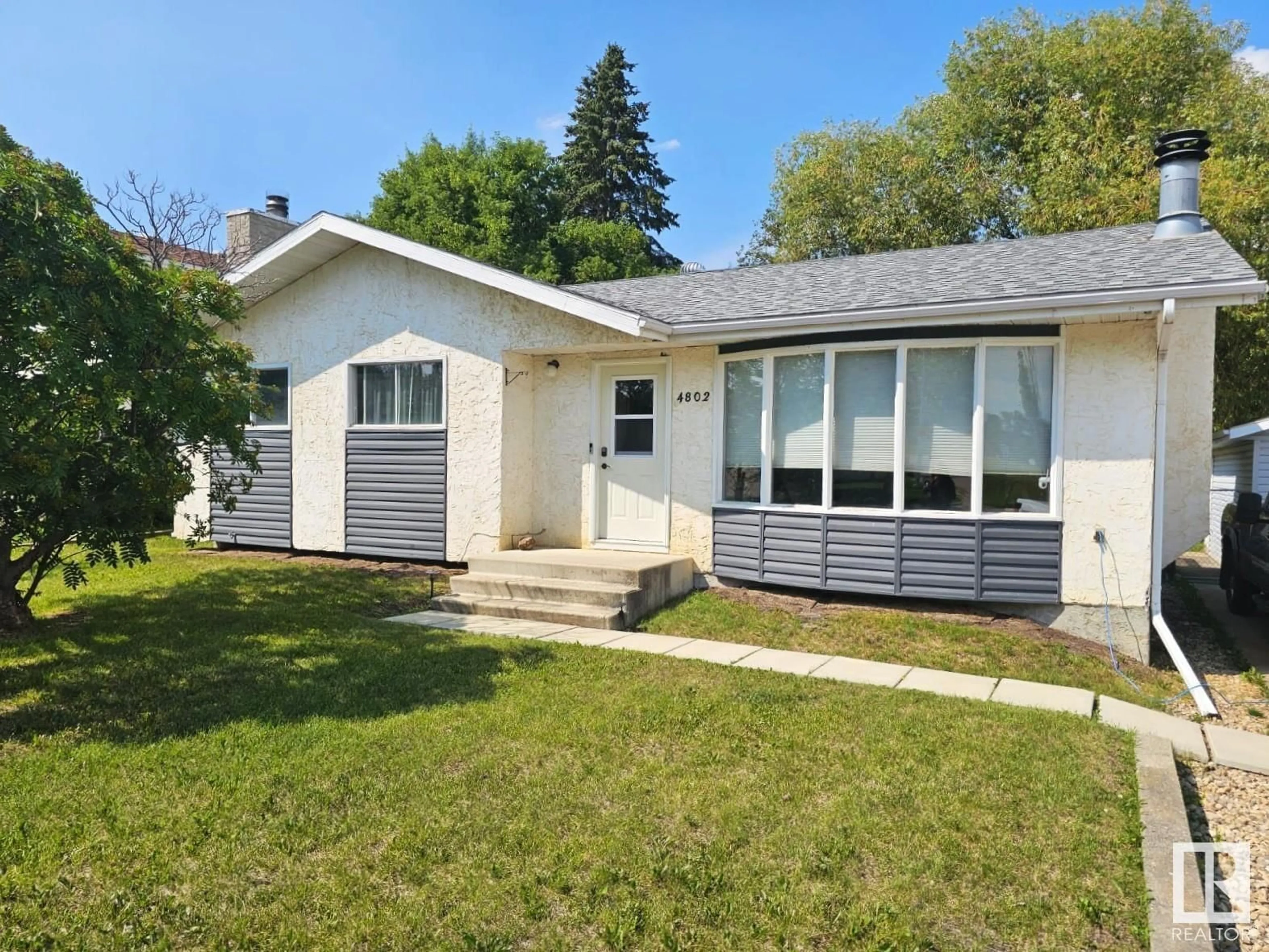 Home with vinyl exterior material, street for 4802 MACKENZIE AV, Drayton Valley Alberta T7A1A5