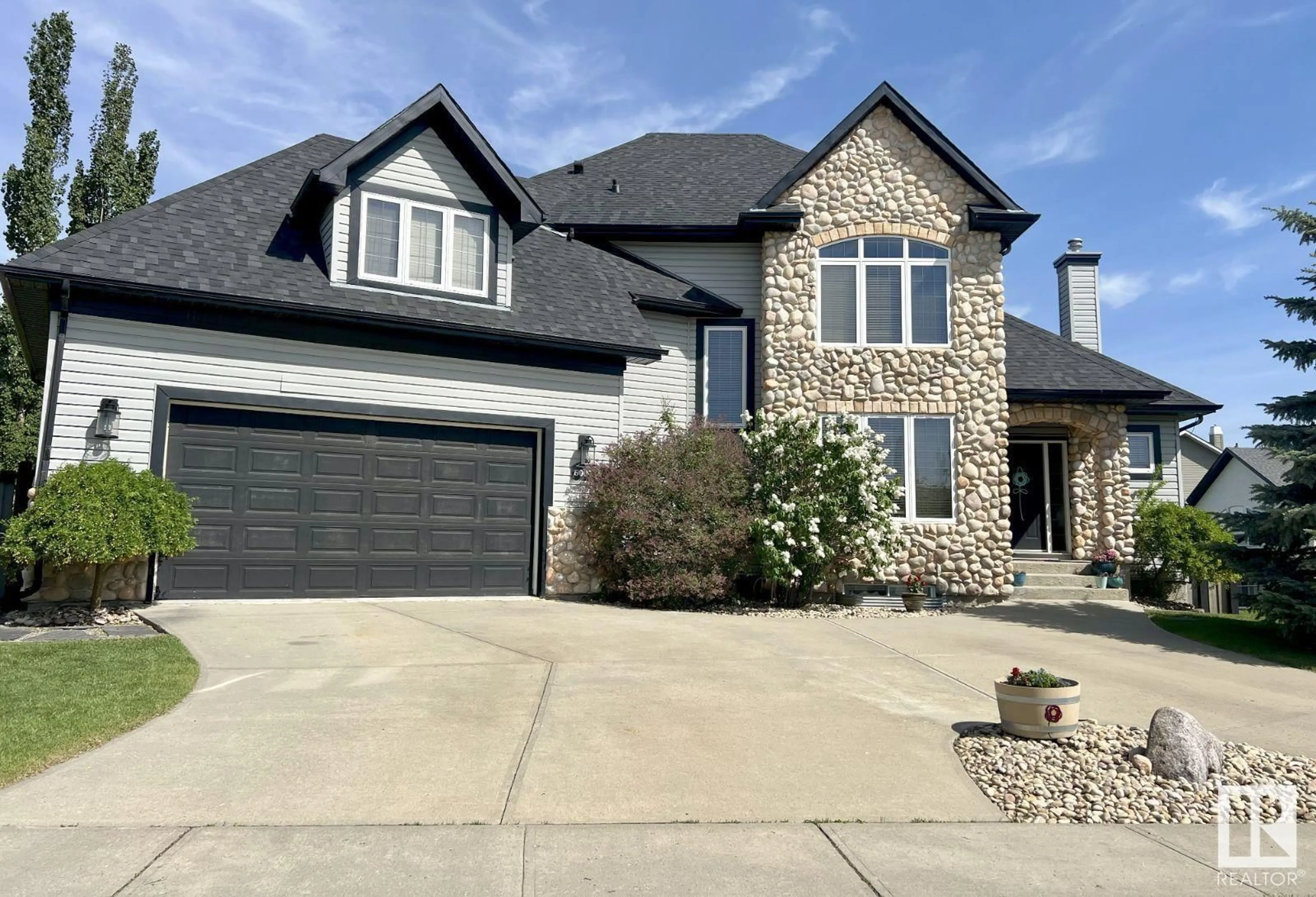 Home with brick exterior material, street for 6004 32 AV, Beaumont Alberta T4X1R3