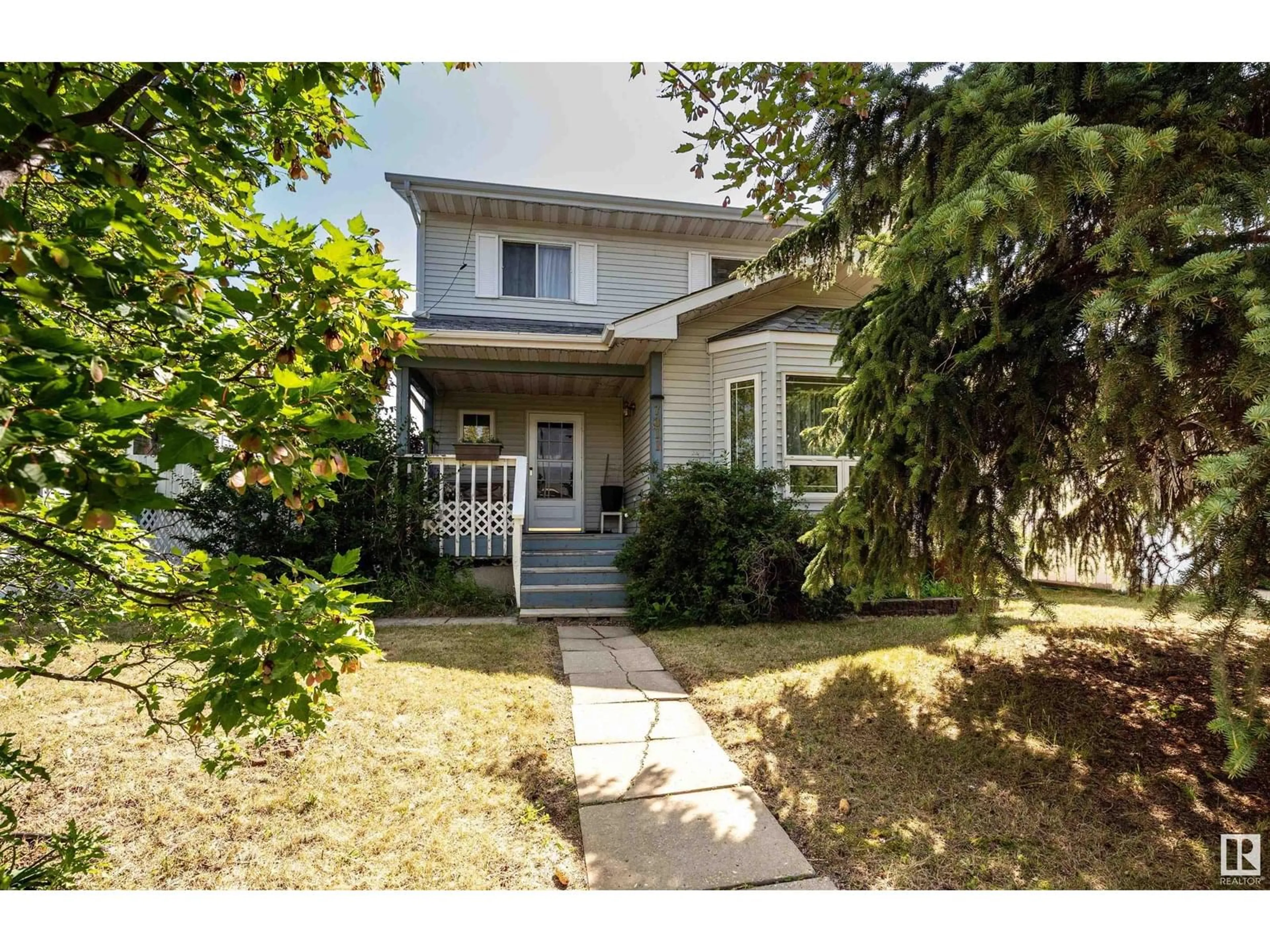 Home with vinyl exterior material, street for NW - 7311 189 ST, Edmonton Alberta T5T5G7