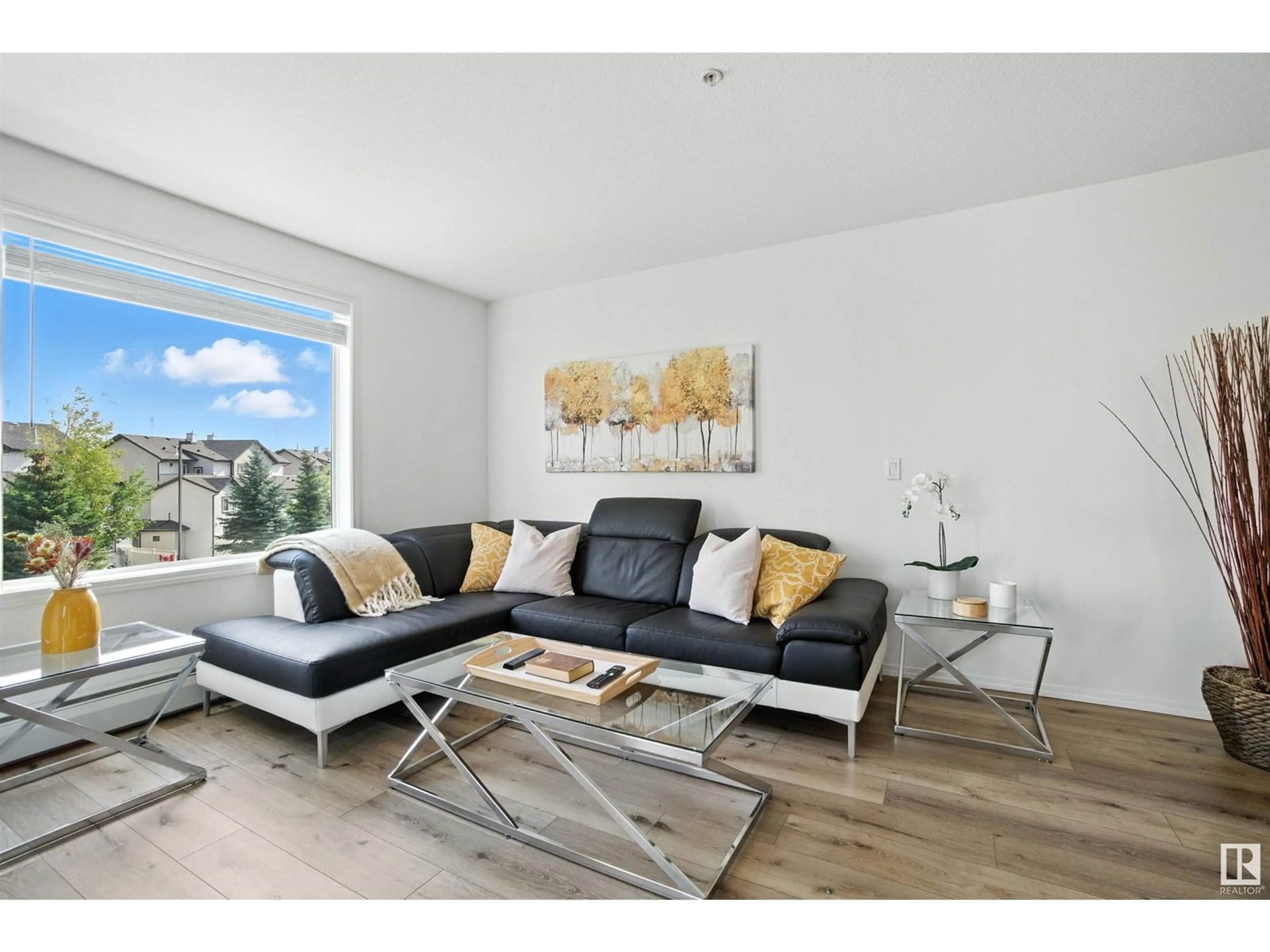 Living room with furniture, wood/laminate floor for 301 SUMMERWOOD BV, Sherwood Park Alberta T8H0C2
