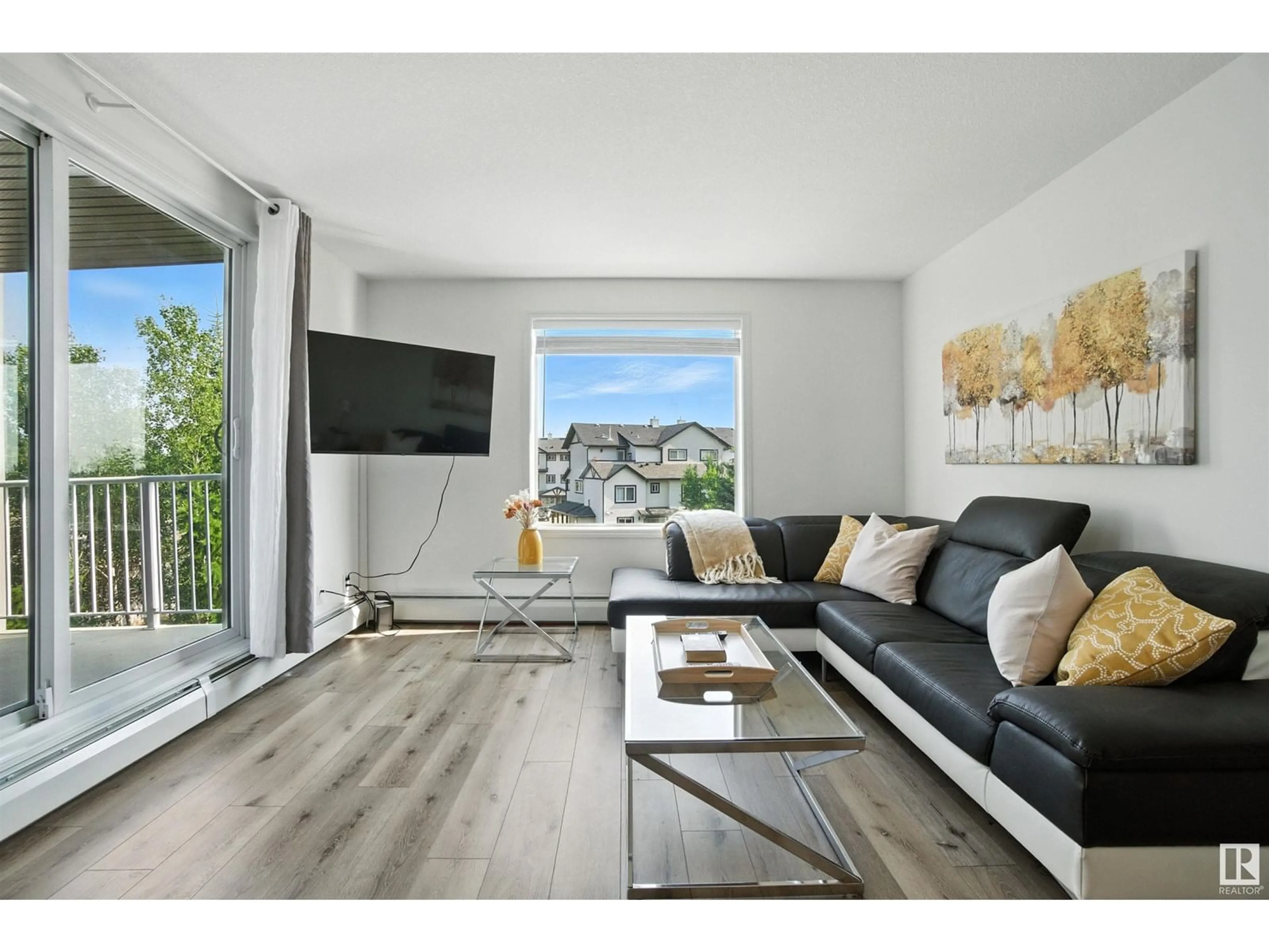 Living room with furniture, wood/laminate floor for 301 SUMMERWOOD BV, Sherwood Park Alberta T8H0C2