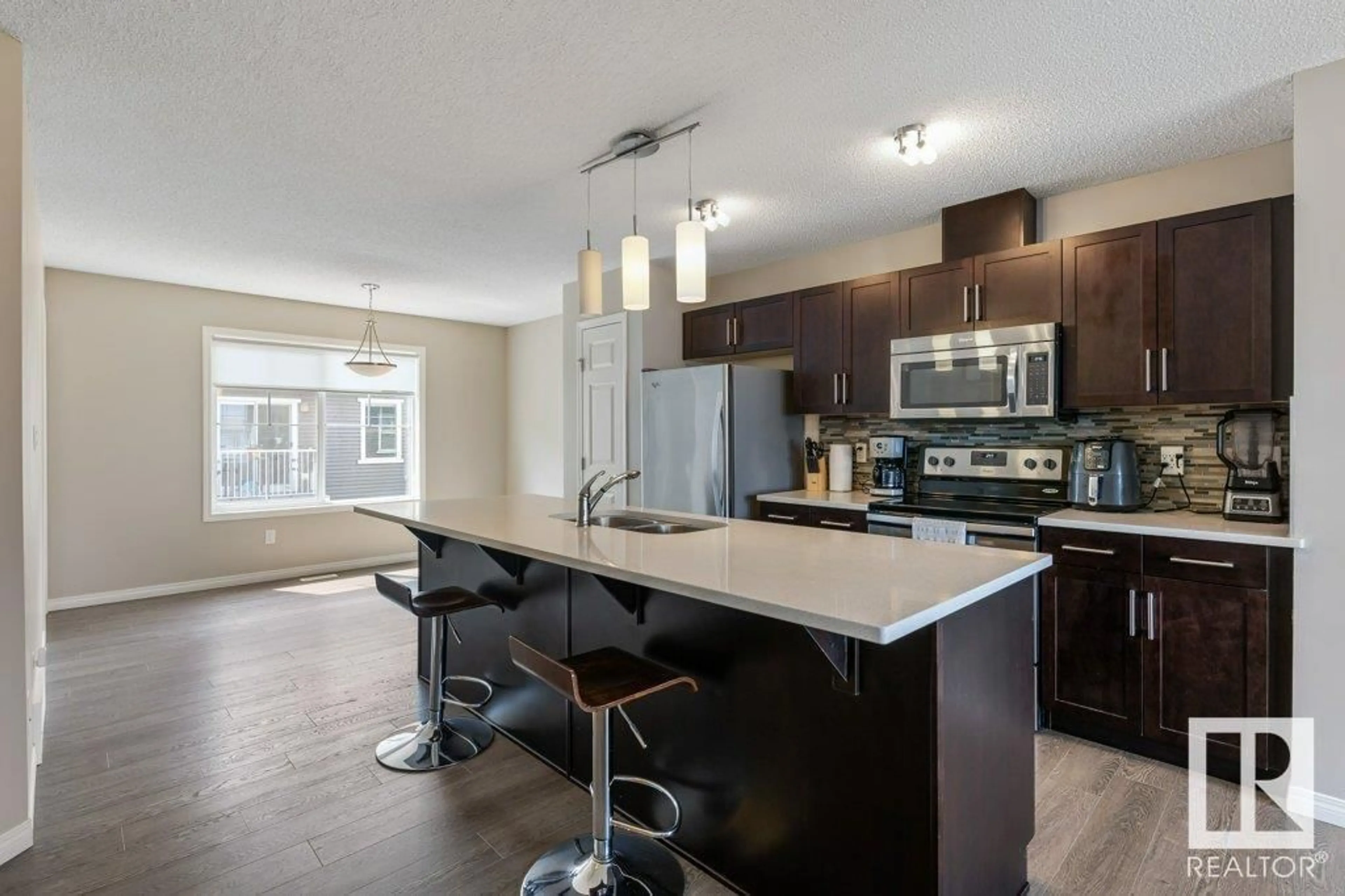 Open concept kitchen, unknown for 20 7385 EDGEMONT WY, Edmonton Alberta T6M0R9