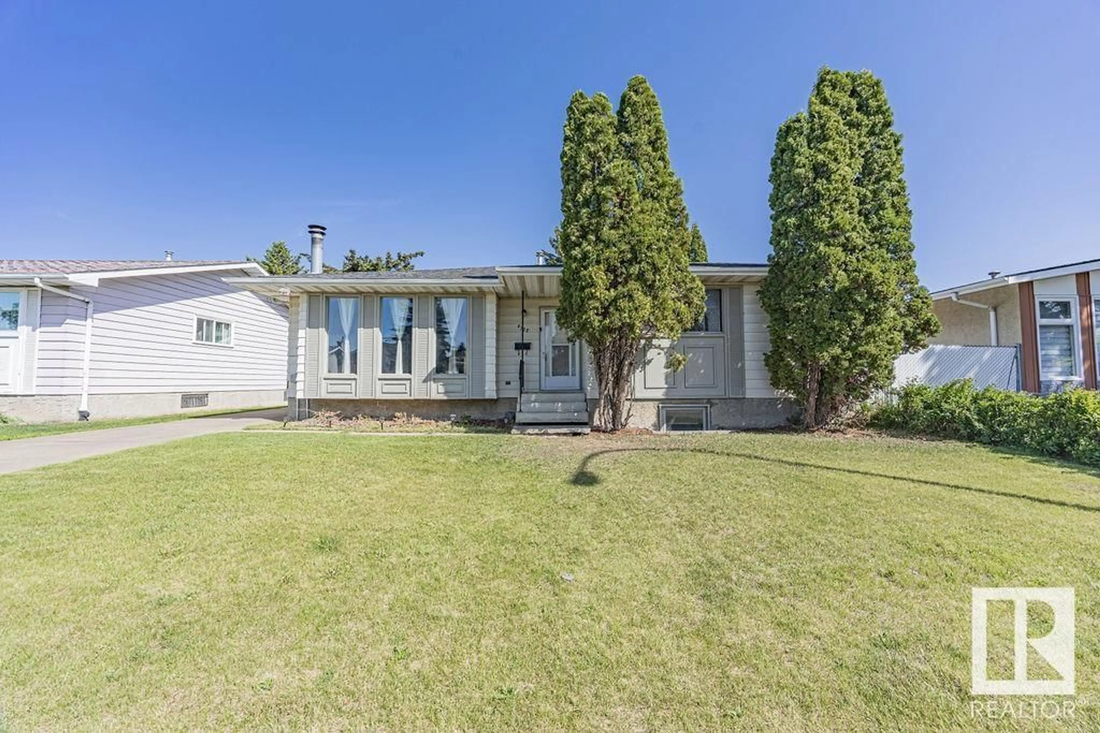 A pic from outside/outdoor area/front of a property/back of a property/a pic from drone, street for NW - 4122 134A AV, Edmonton Alberta T5A2N5