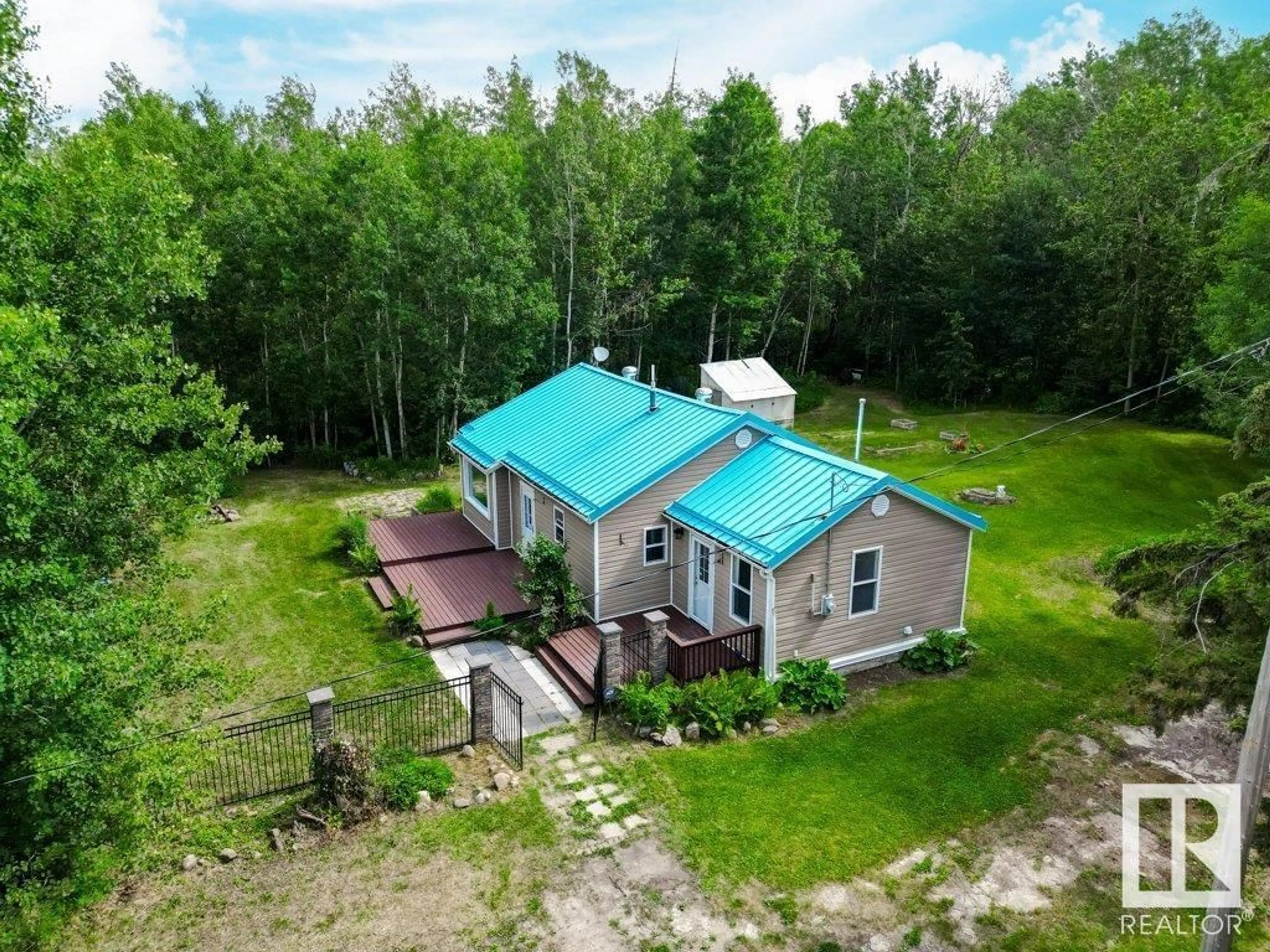 A pic from outside/outdoor area/front of a property/back of a property/a pic from drone, building for 54503 STE. ANNE TR, Rural Lac Ste. Anne County Alberta T0E1A1