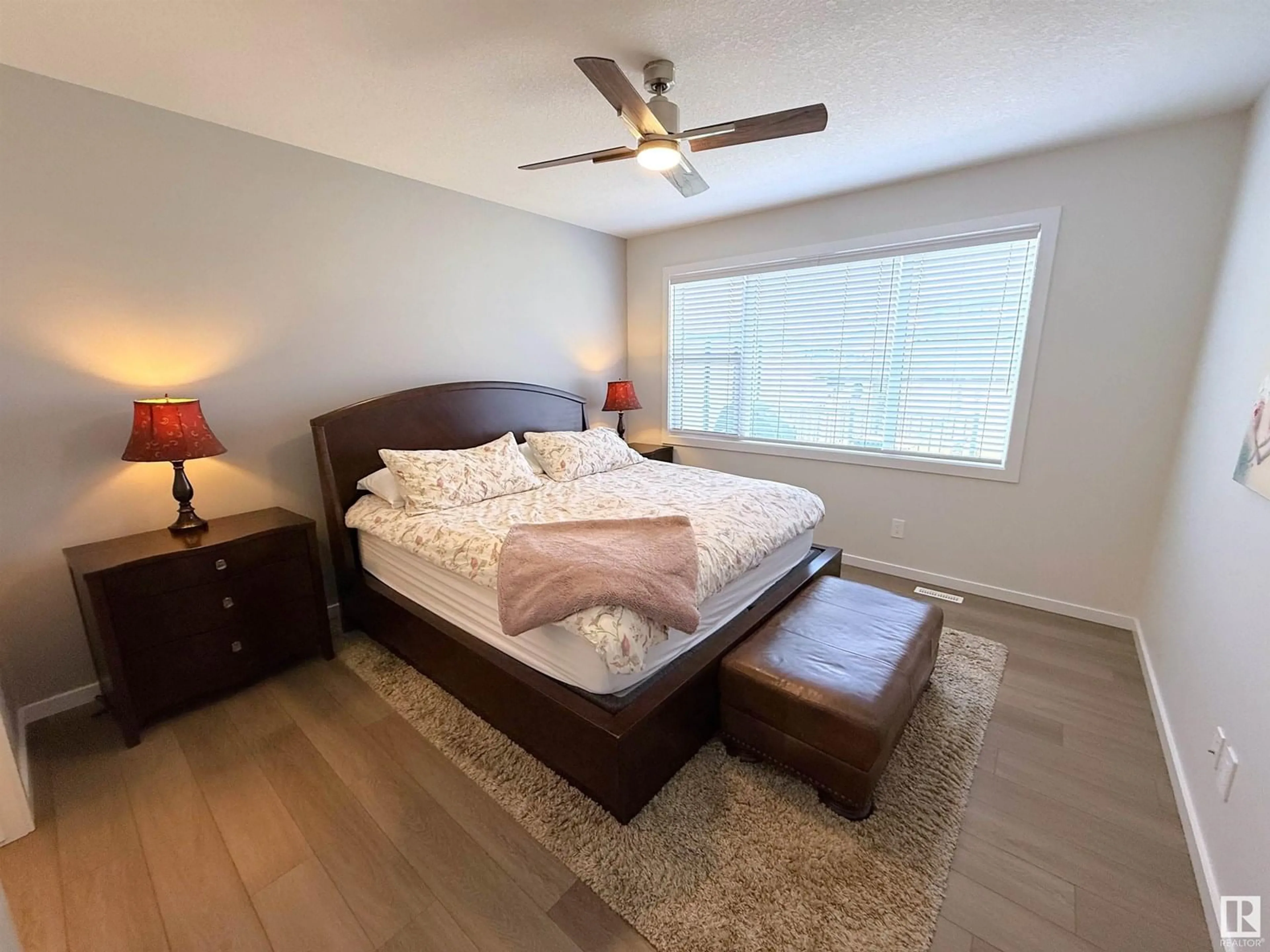 Bedroom with bed, wood/laminate floor for 22114 81A AV, Edmonton Alberta T5T7T4