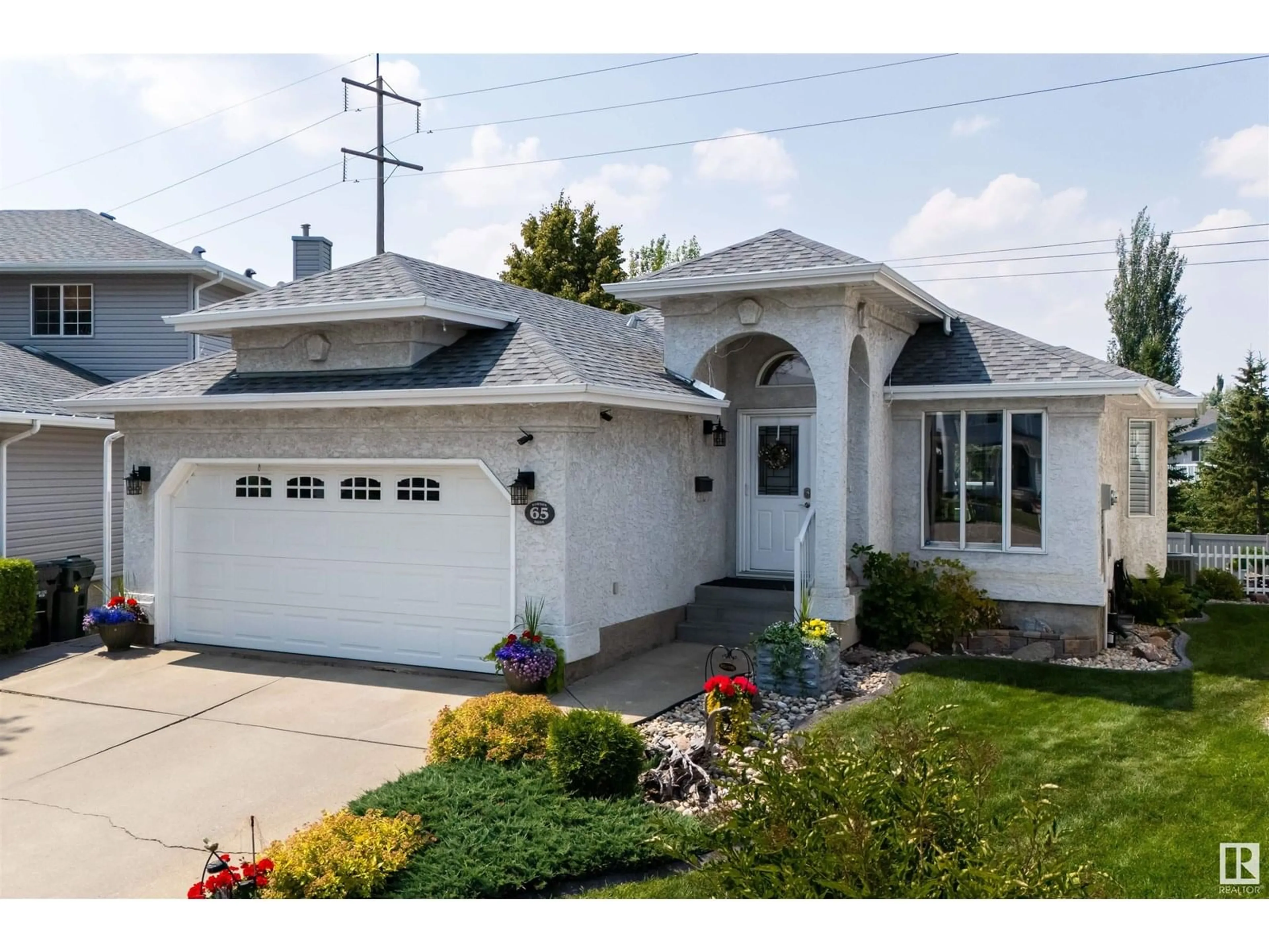 Home with vinyl exterior material, street for 65 DAWSON DRIVE, Sherwood Park Alberta T8H1T7