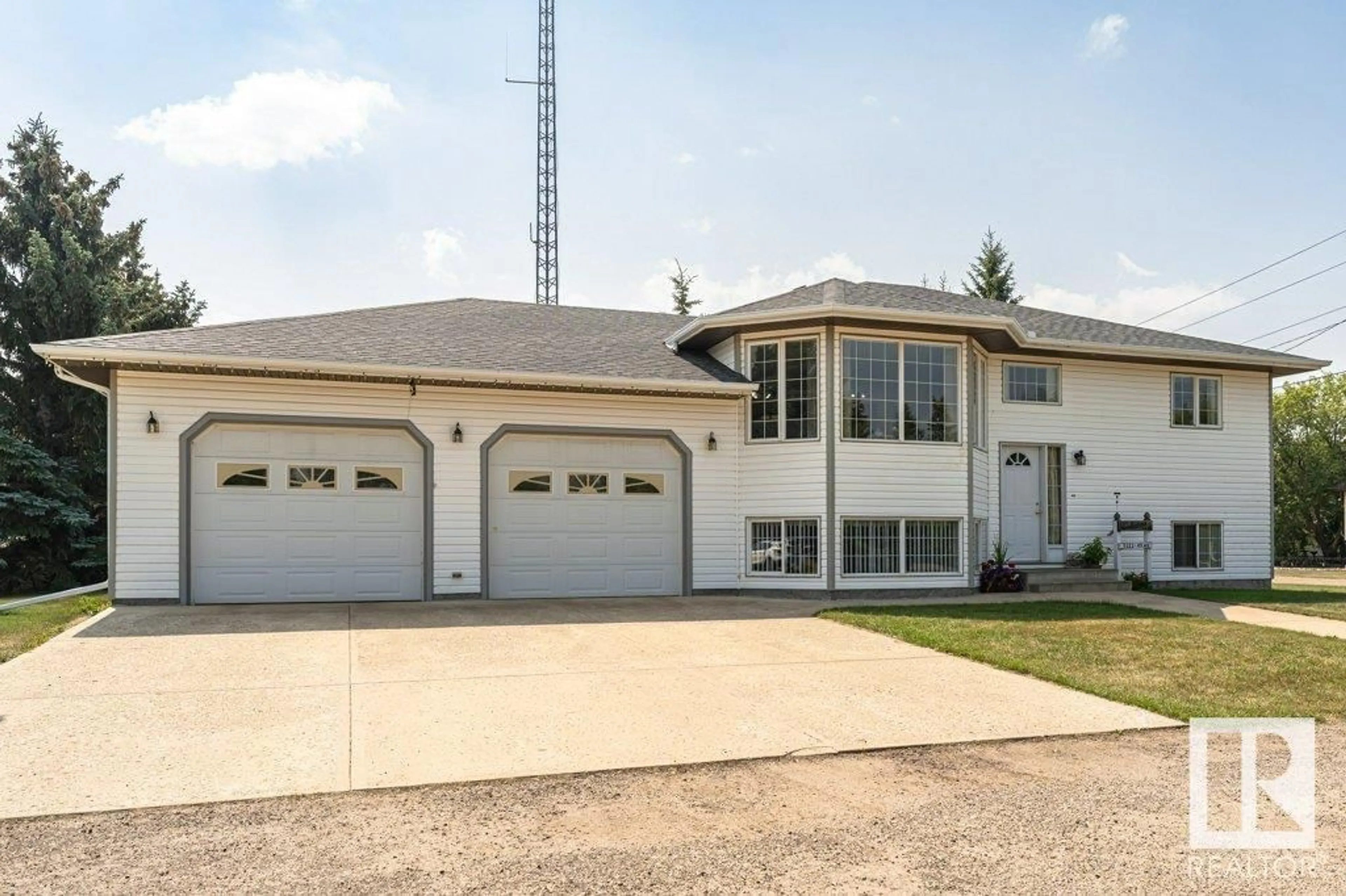 Home with vinyl exterior material, street for 5322 49 AV, Andrew Alberta T0B0C0