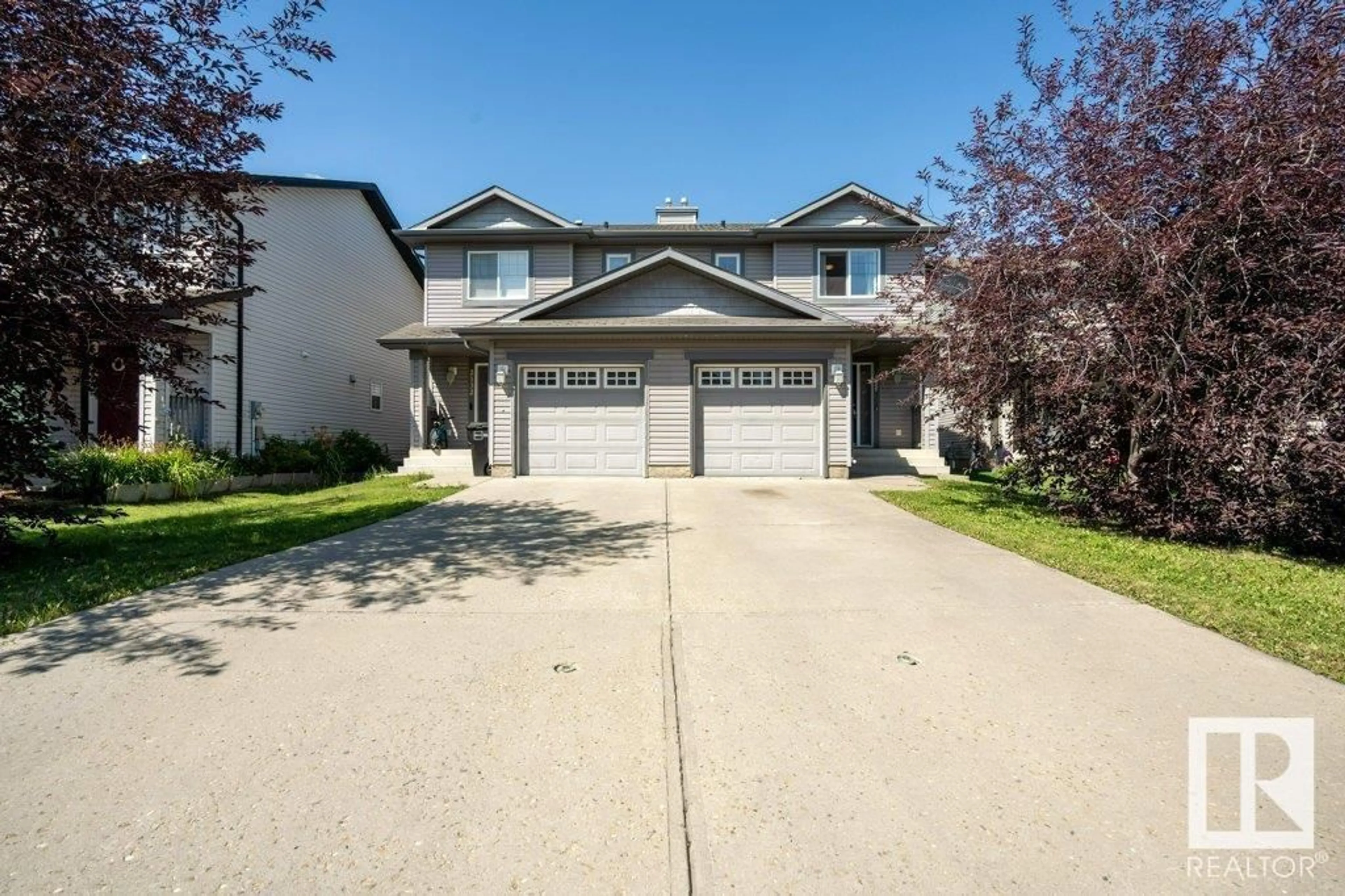 A pic from outside/outdoor area/front of a property/back of a property/a pic from drone, street for 2134 HAMMOND CO NW, Edmonton Alberta T6M0J1