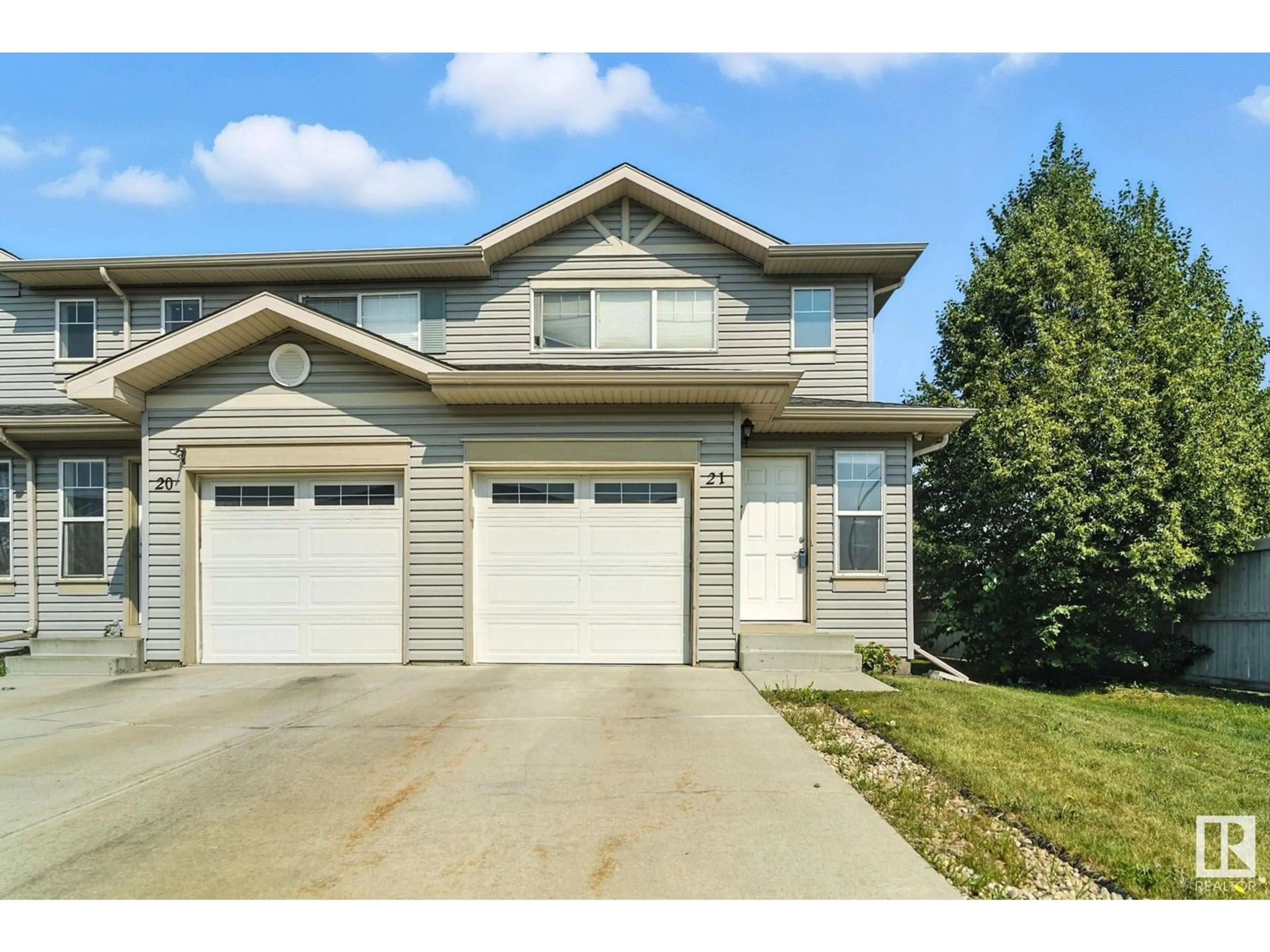Home with vinyl exterior material, street for 21 - 18004 89 ST, Edmonton Alberta T5Z0E7