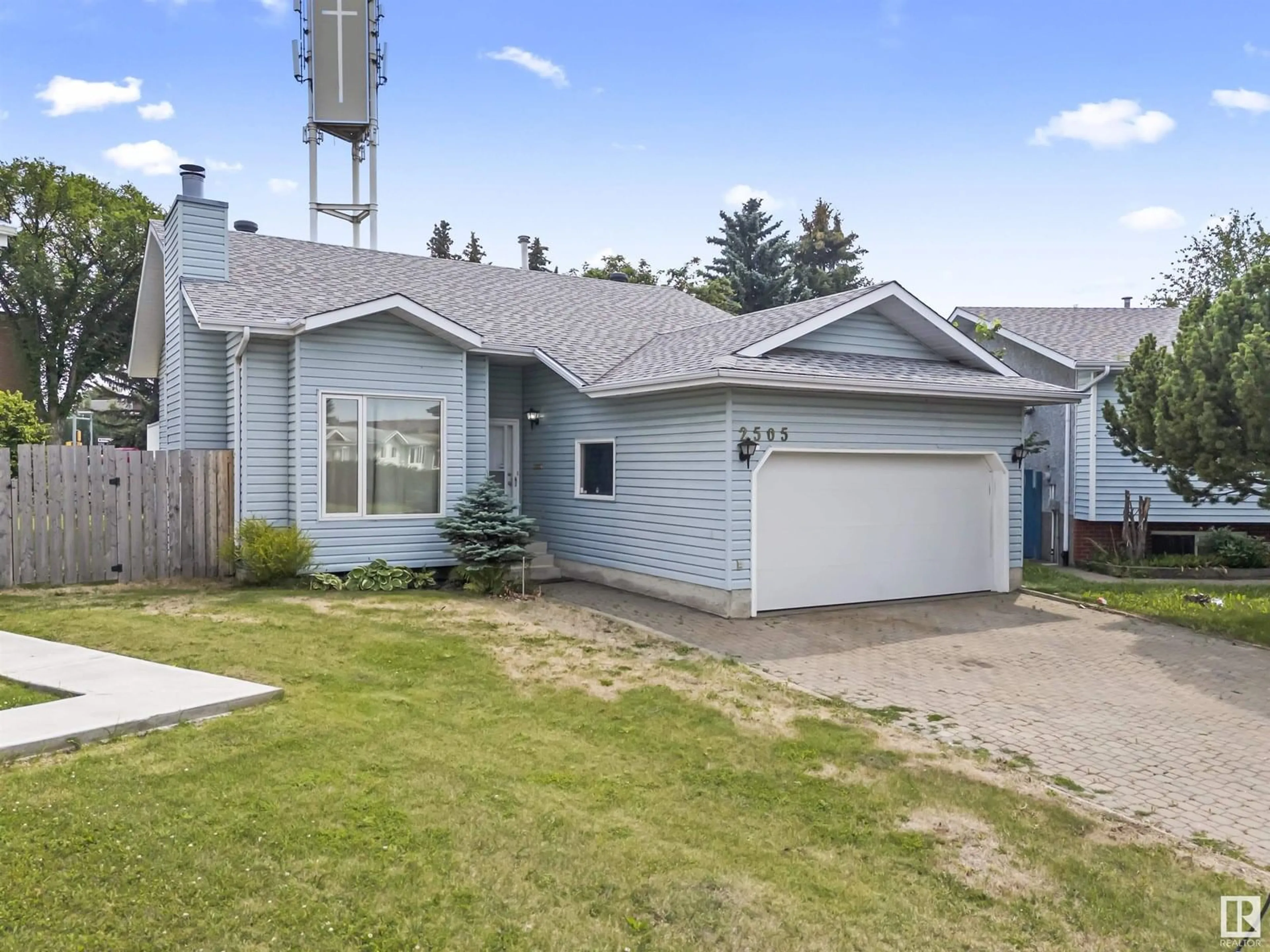 Home with vinyl exterior material, street for NW - 2505 38A ST, Edmonton Alberta T6L4L6